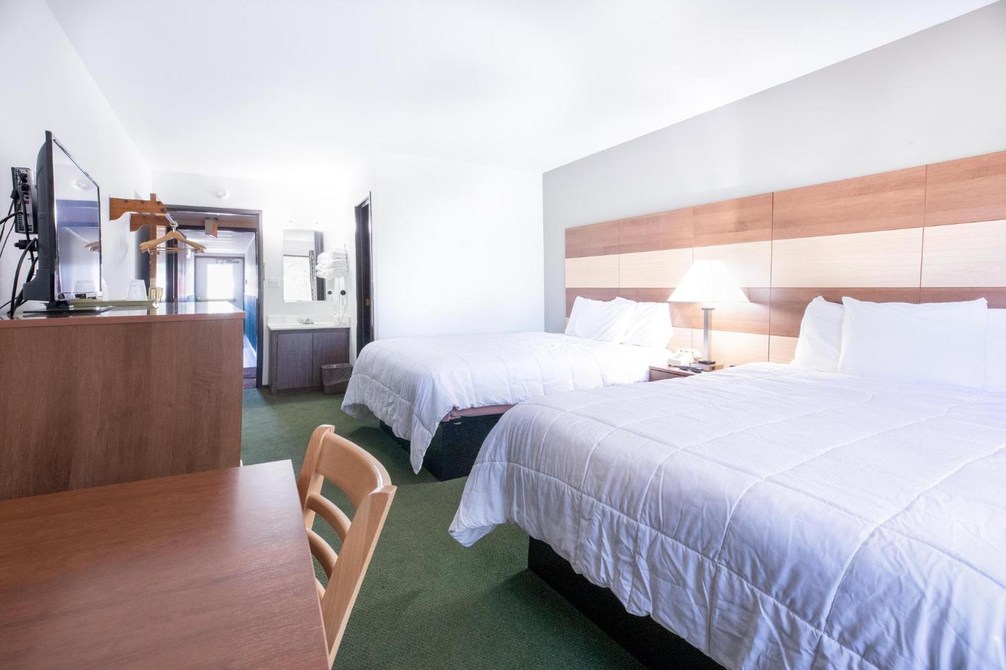 Queen Room with Two Queen Beds - Photo 1