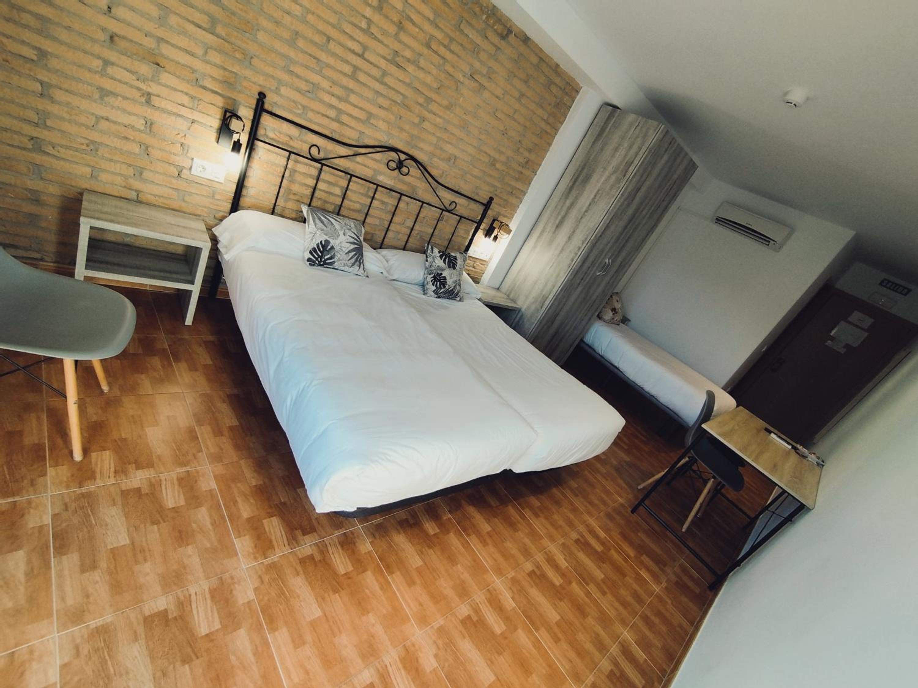Habitación Doble Deluxe con Dos Camas Dobles