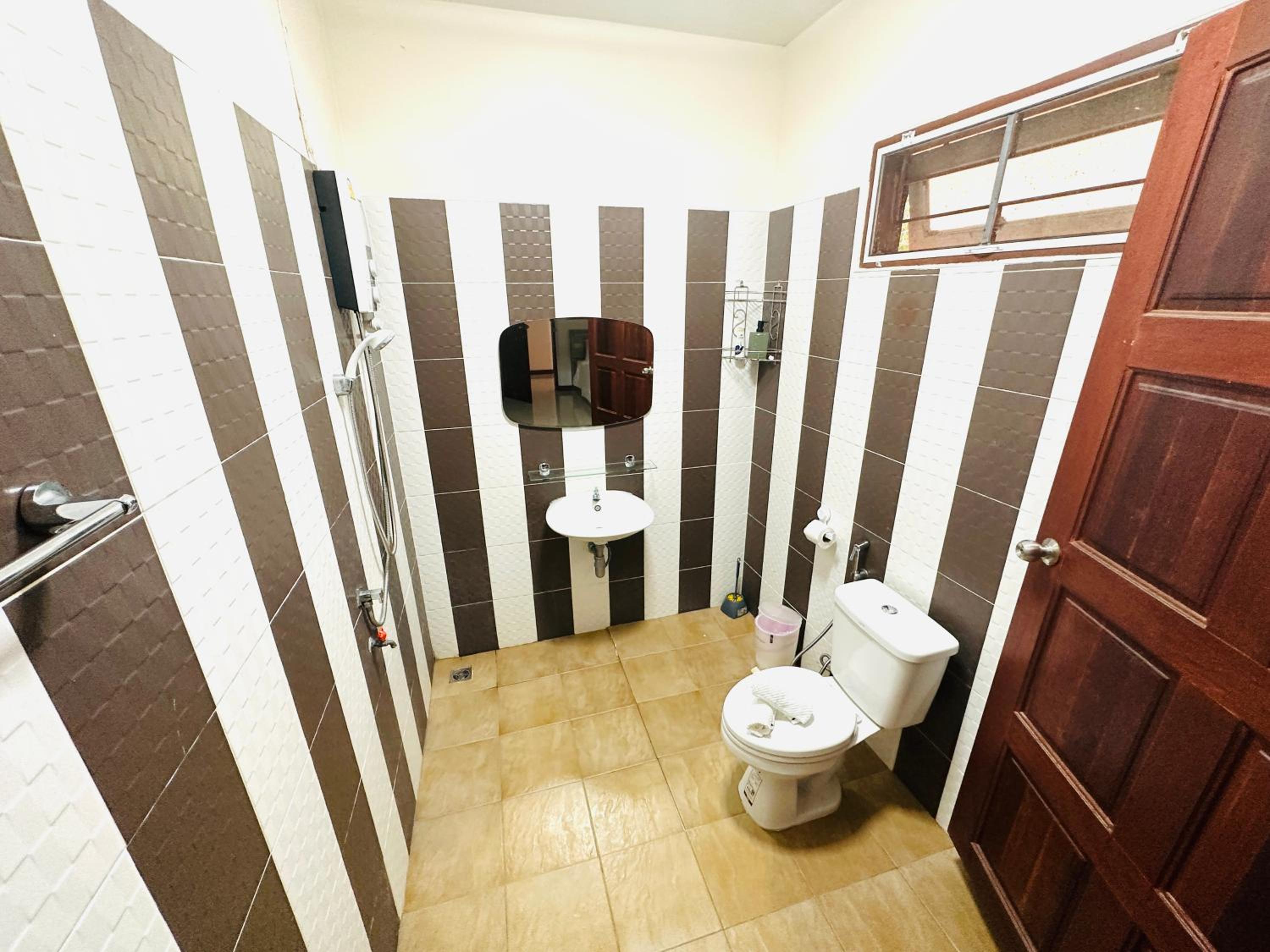 Three-Bedroom House - Photo 20