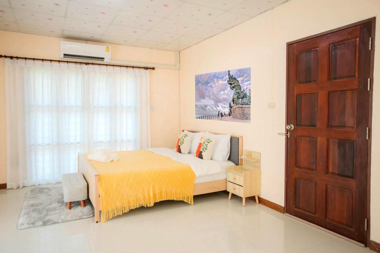 Three-Bedroom House - Photo 21