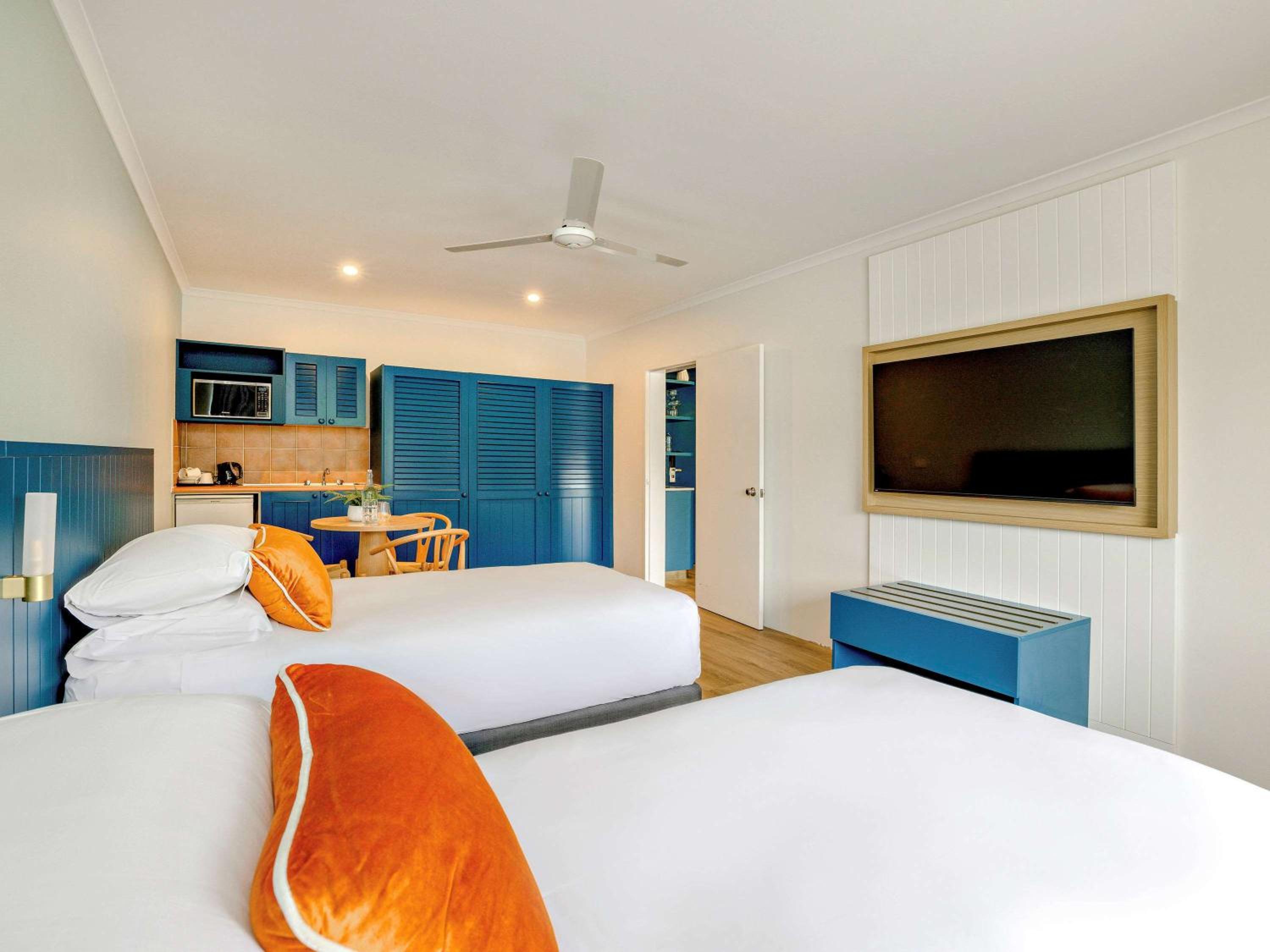Family Room with One Queen and Two Twin Beds - Photo 2