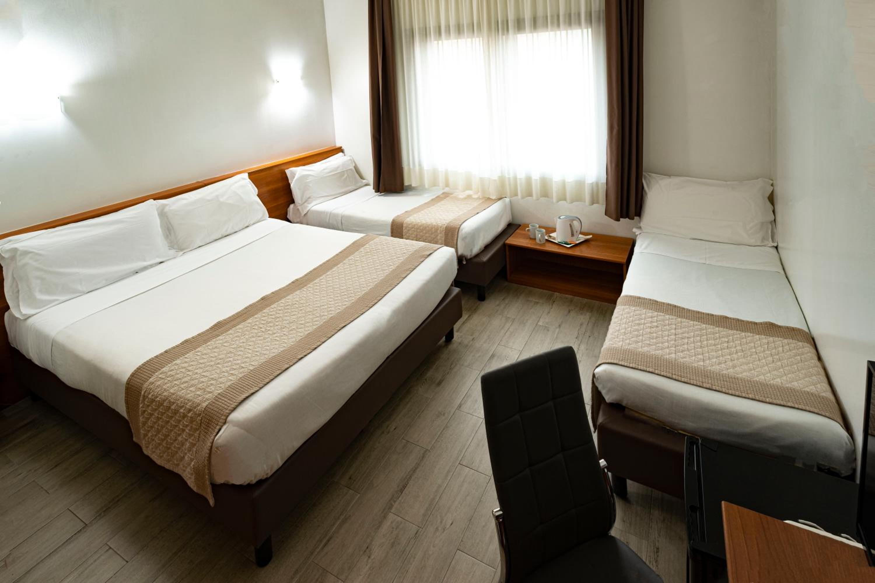 Triple Room - Photo 1
