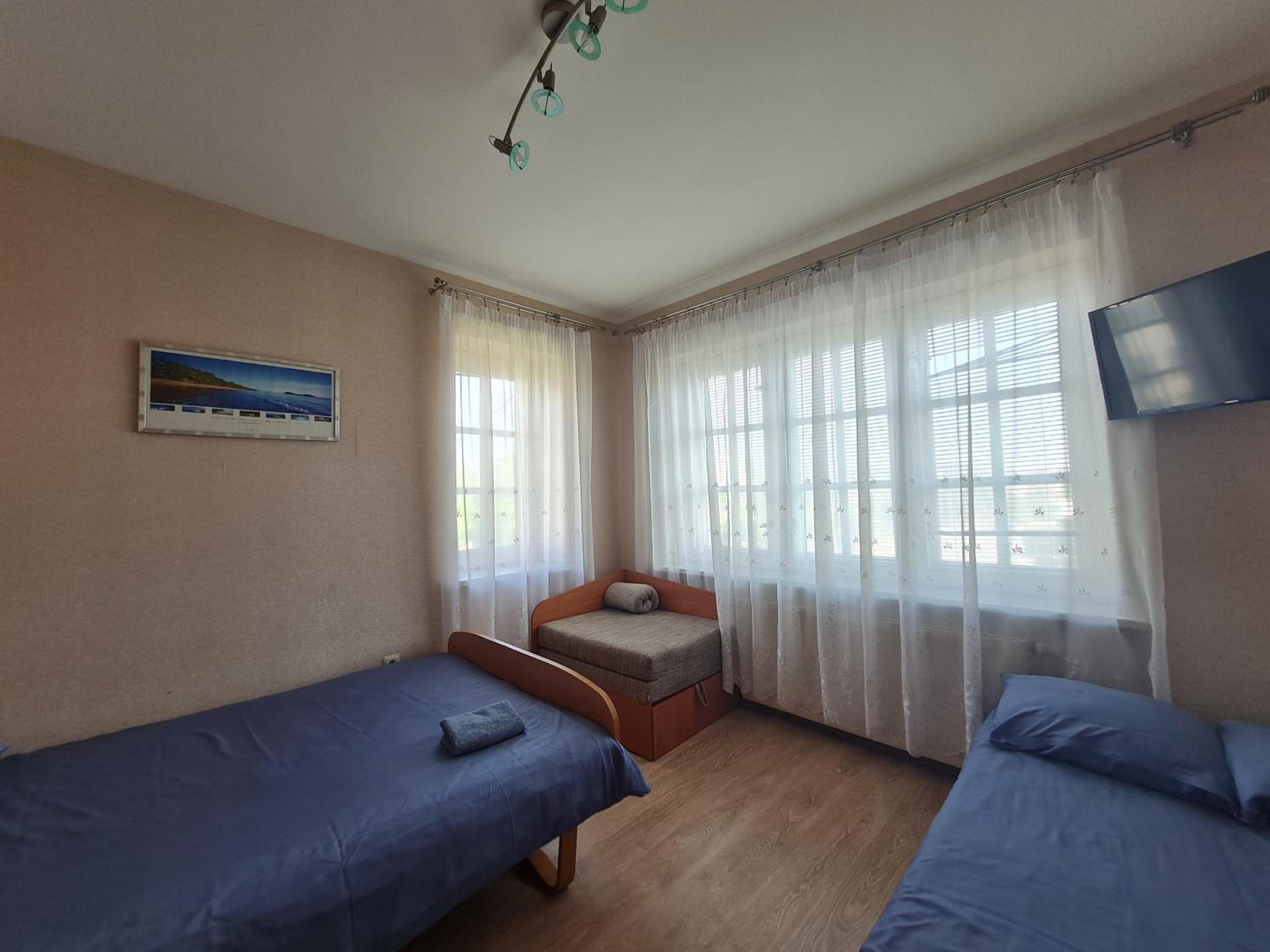 Quadruple Room with Shared Bathroom