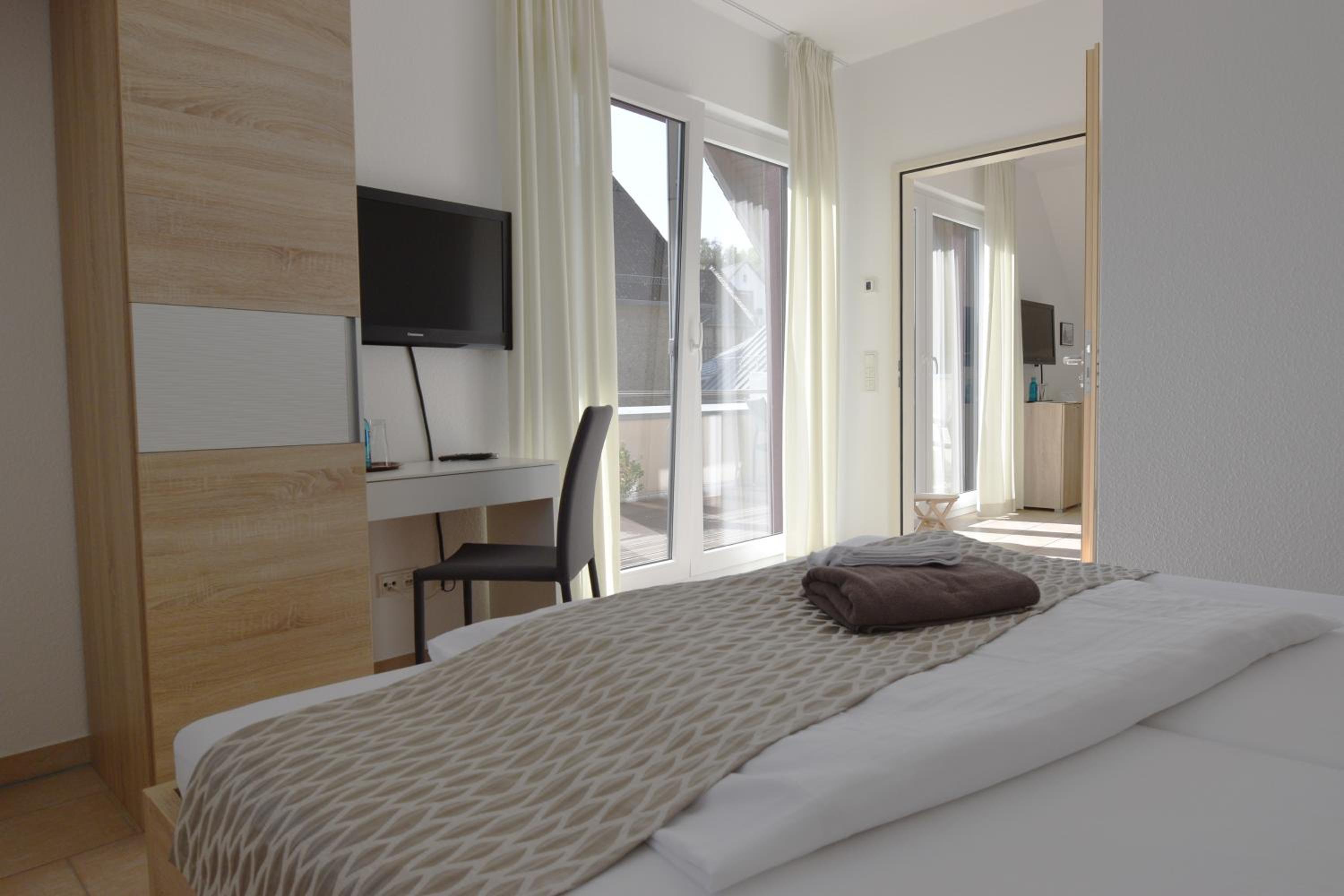 Quadruple Room with Balcony photo 3