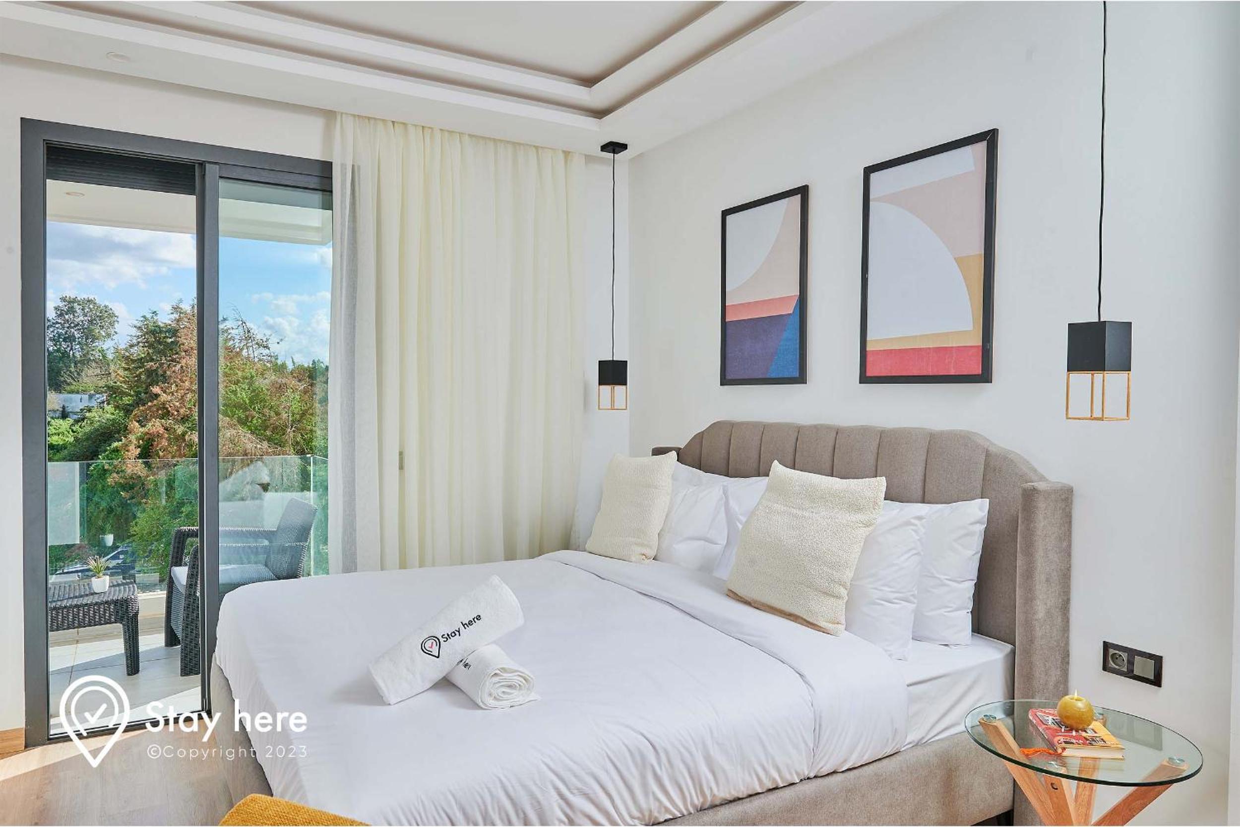 Three-Bedroom Apartment with Balcony photo 1