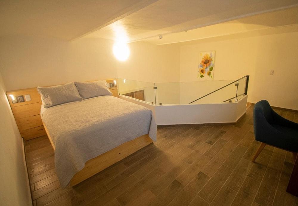 Deluxe Queen Room with Two Queen Beds - Photo 1
