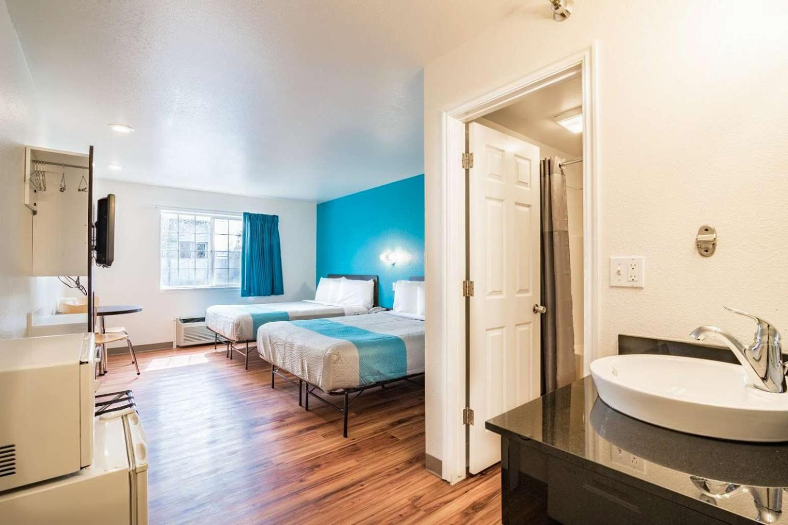Deluxe Queen Room with Two Queen Beds - Photo 1