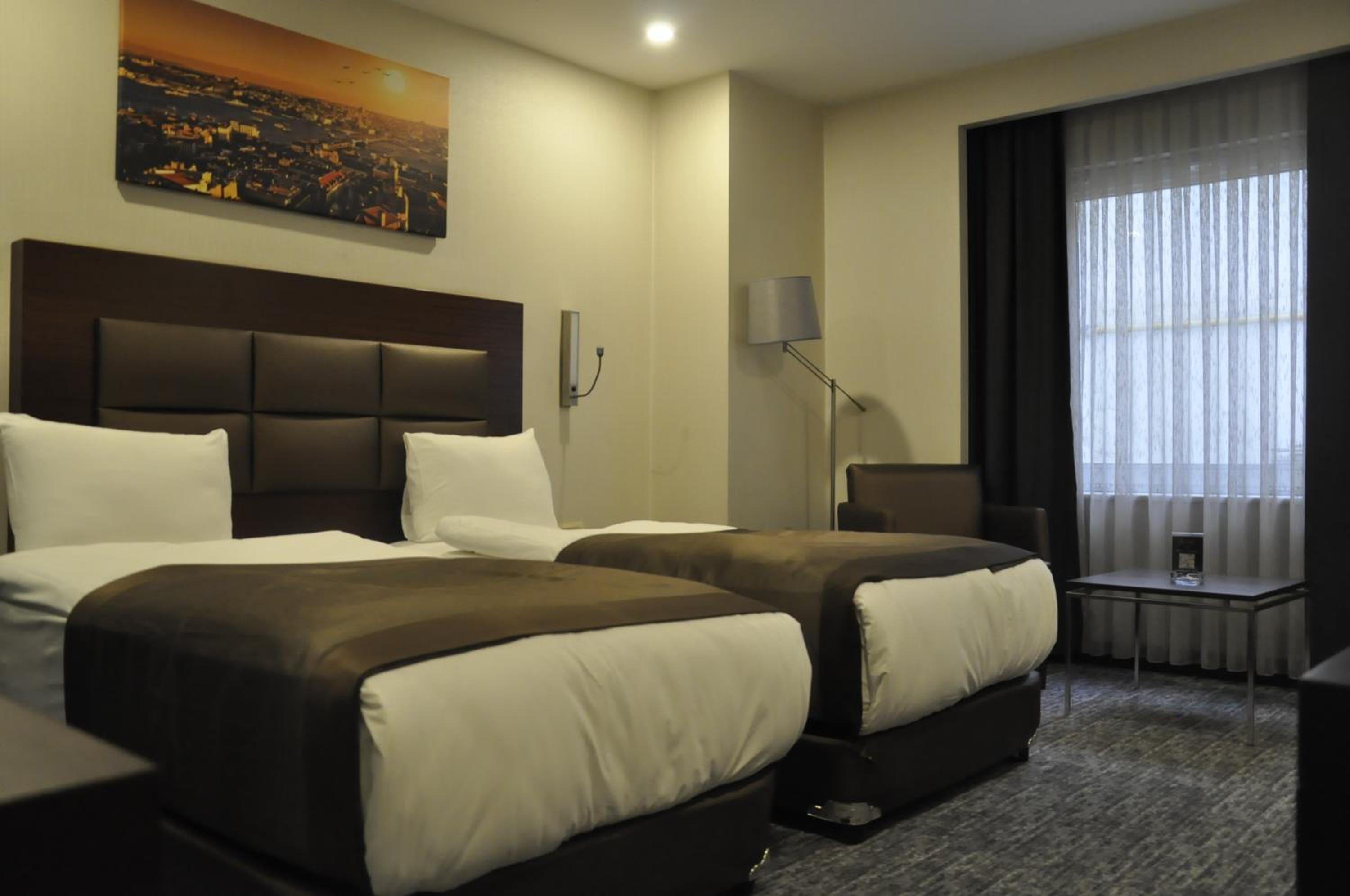 Standard Twin Room - Photo 4