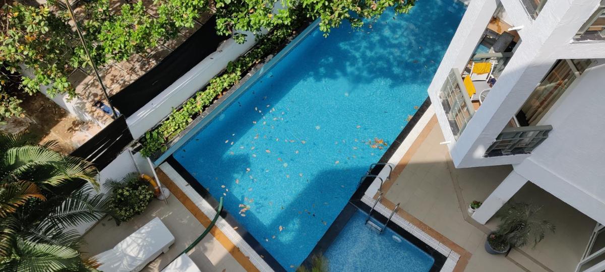 Study room with balcony and pool view photo 2