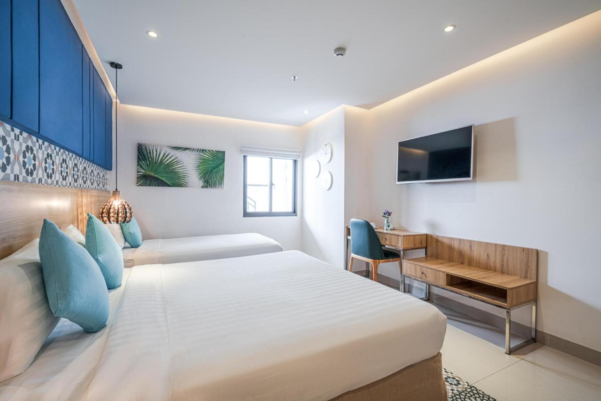 Deluxe Triple Room - Photo 2