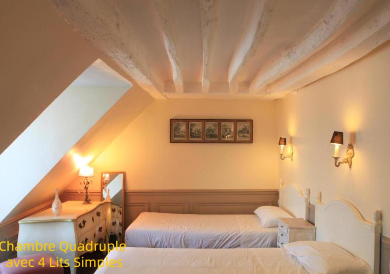 Quadruple Room with four single beds photo 3