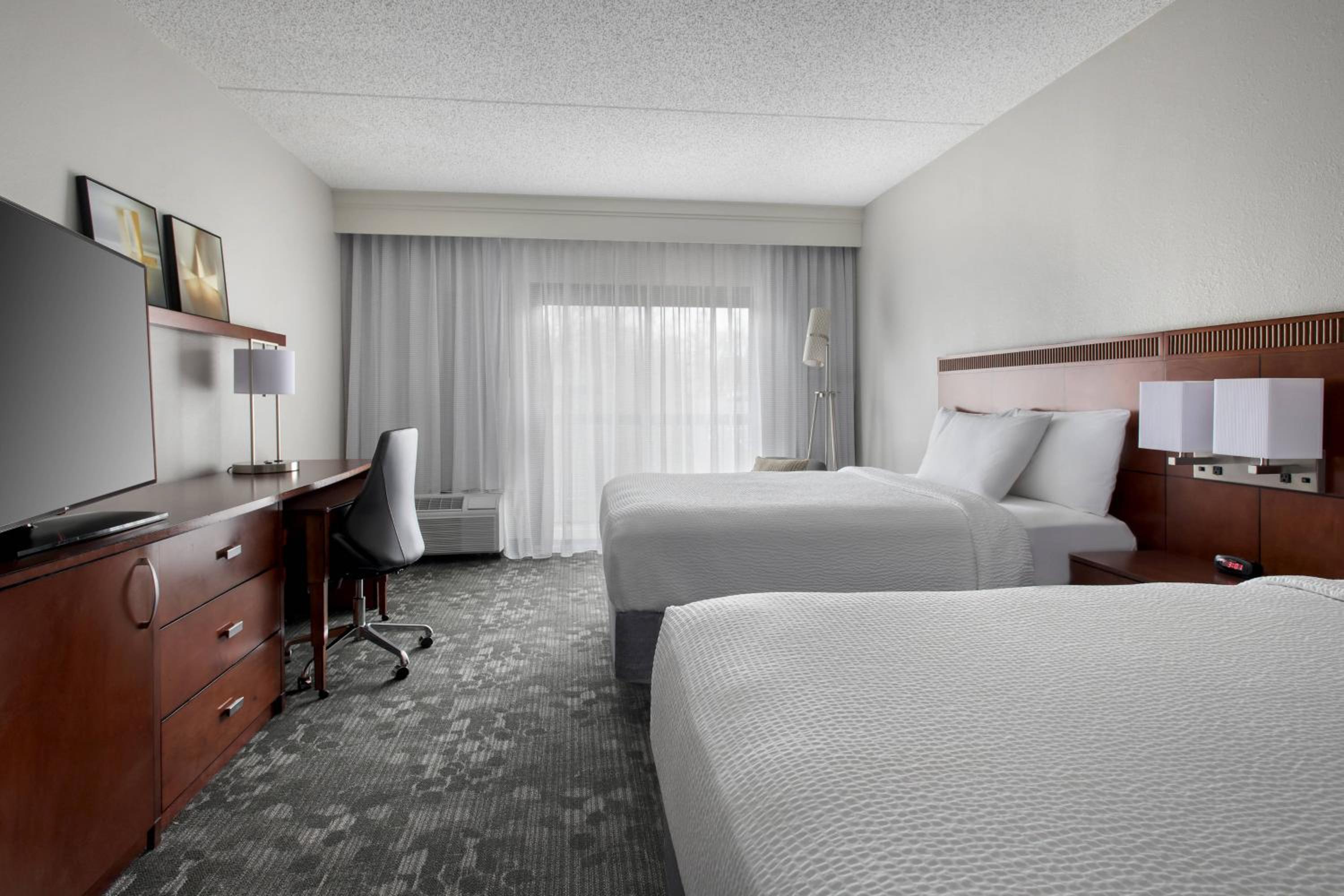 Queen Room with Two Queen Beds - Photo 1