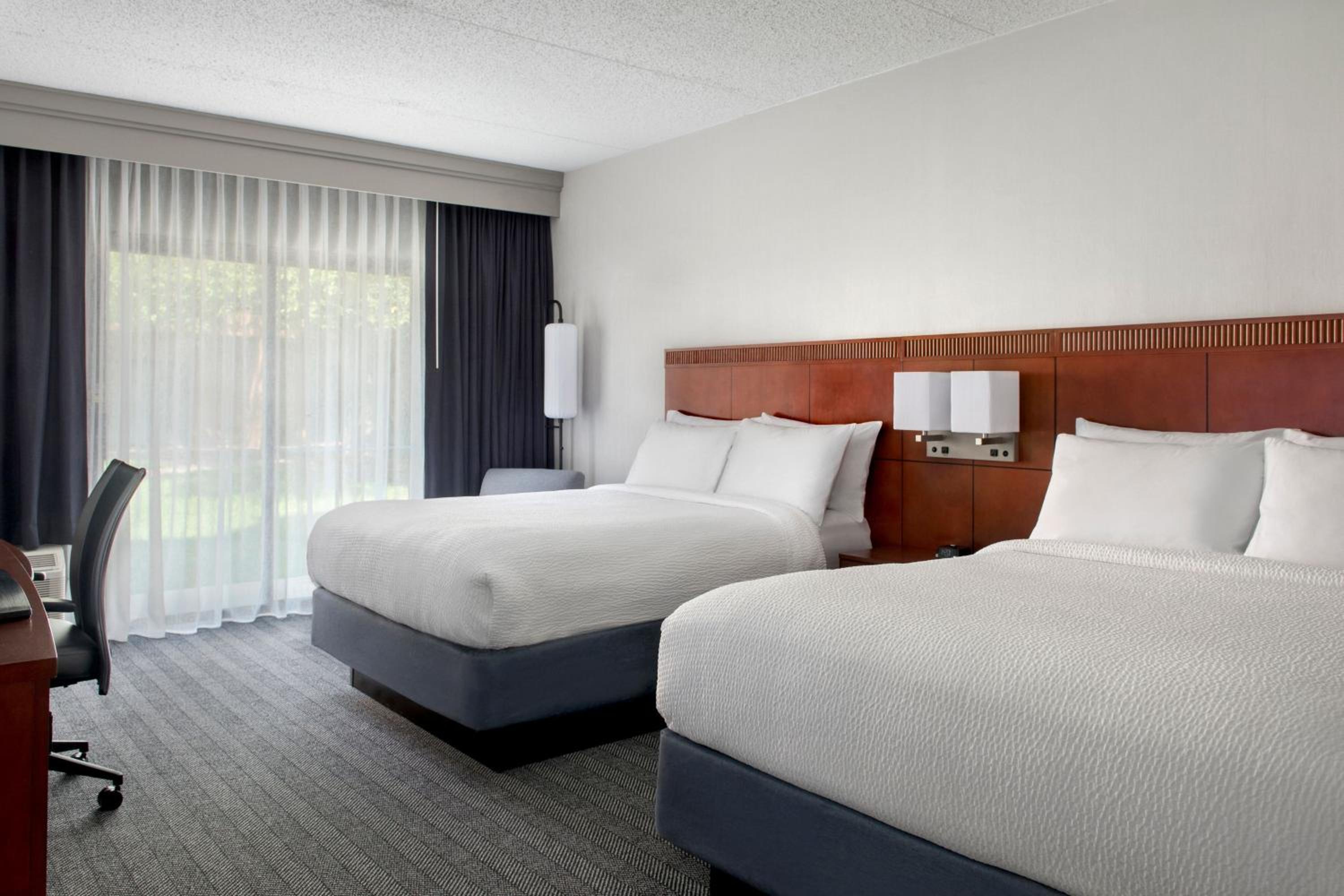 Queen Room with Two Queen Beds - Photo 1