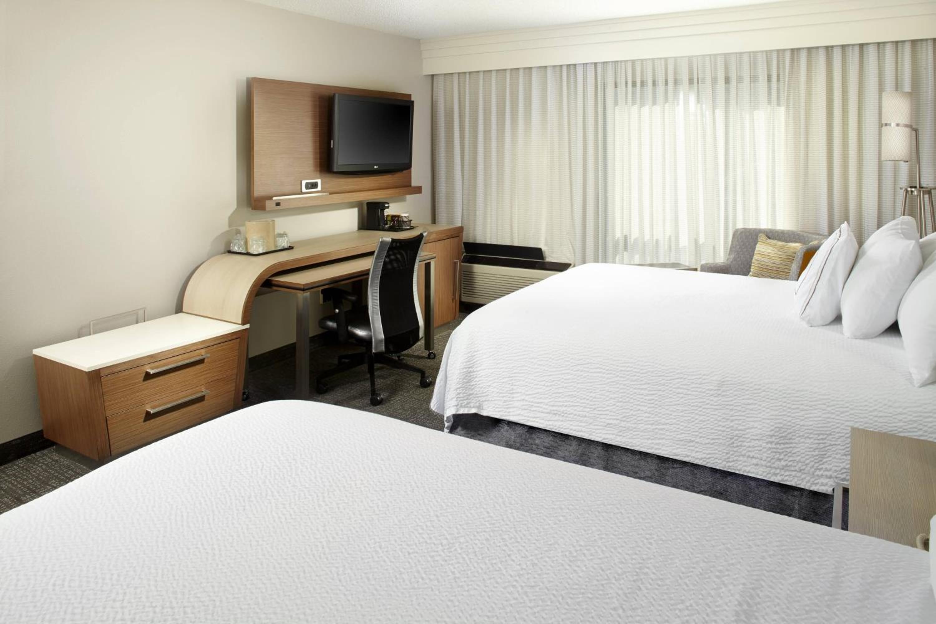 Queen Room with Two Queen Beds - Photo 1