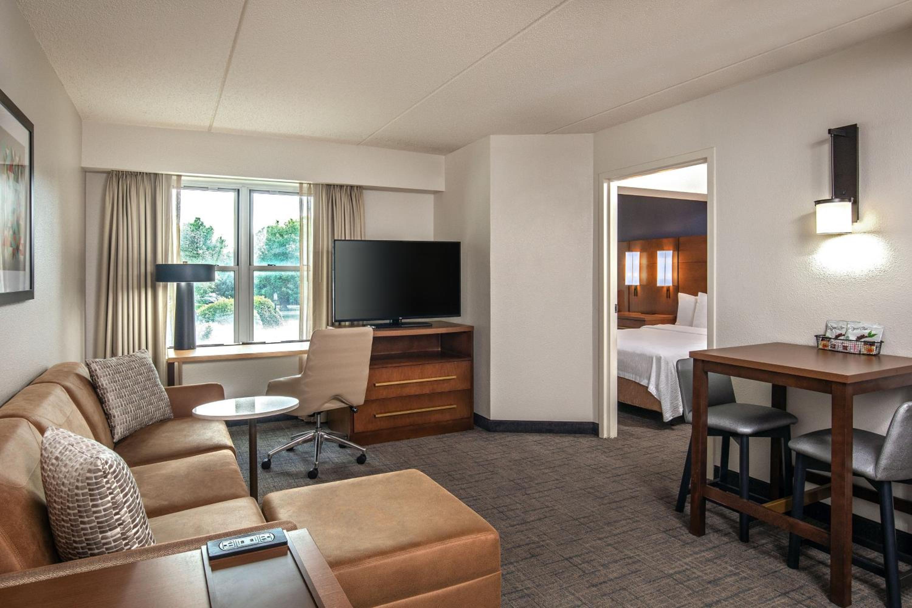 One-Bedroom Queen Suite with Two Queen Beds, Sofa Bed, Full Kitchen, Living Space - Photo 3