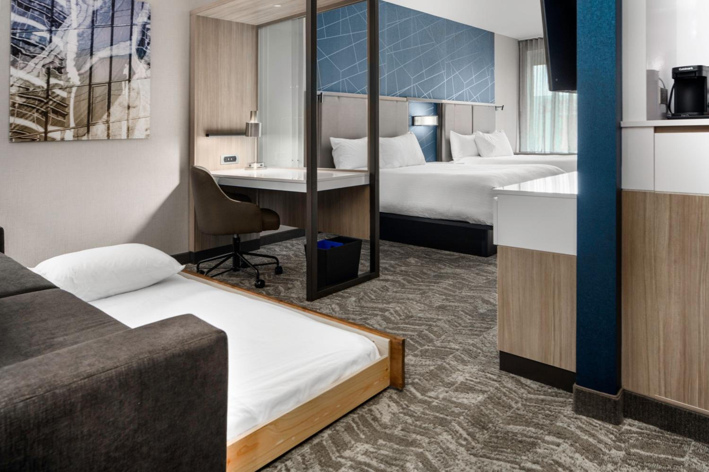 Queen Suite with Two Queen Beds and Trundle Sofa - Photo 1