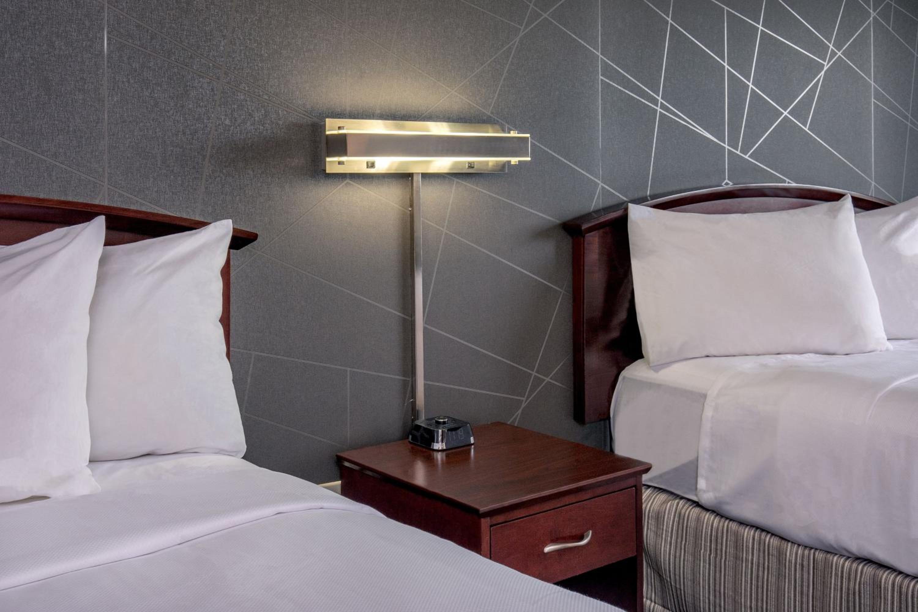 Queen Suite with Two Queen Beds and Trundle Sofa - Photo 10
