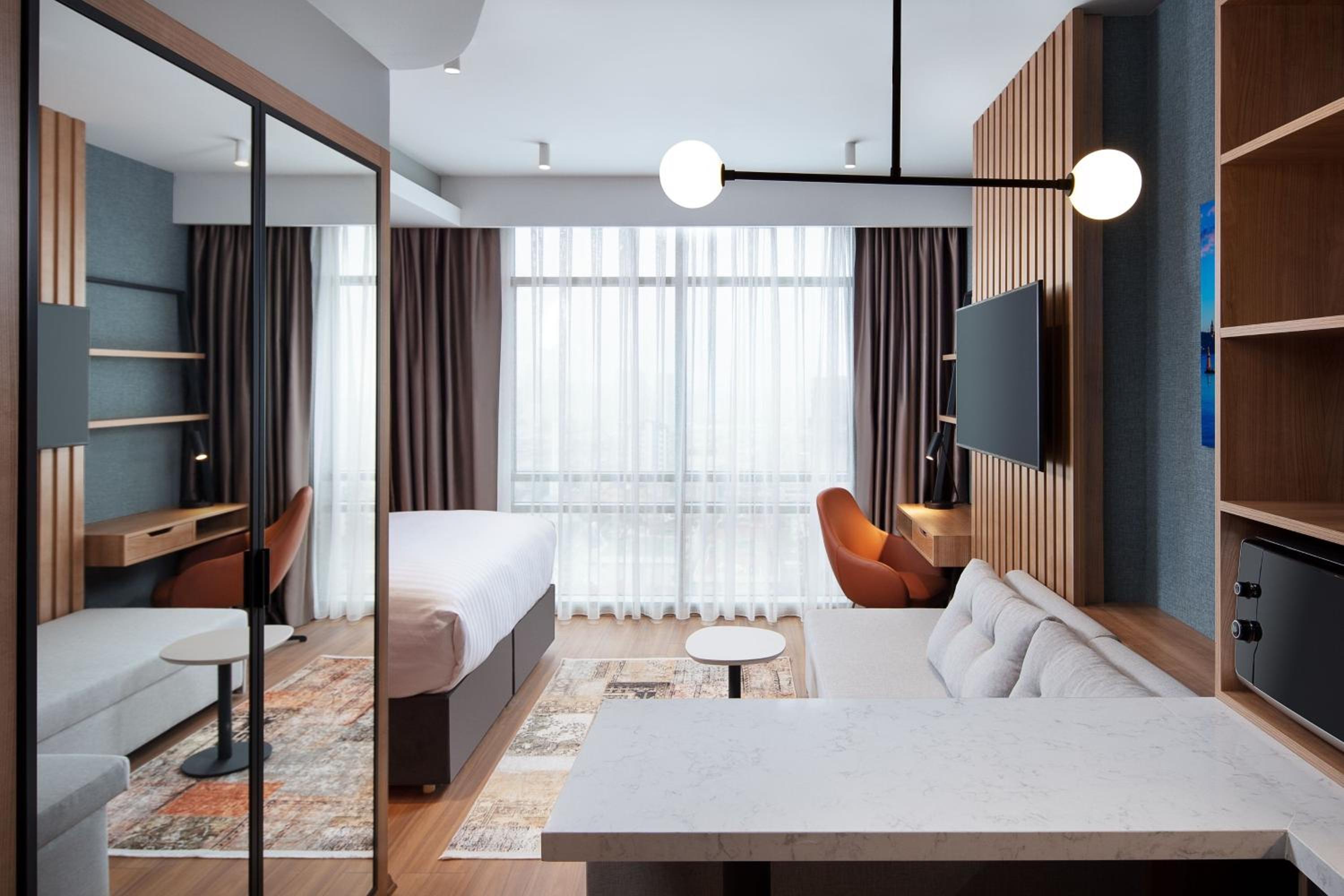 Queen Studio with Sofa Bed and City View