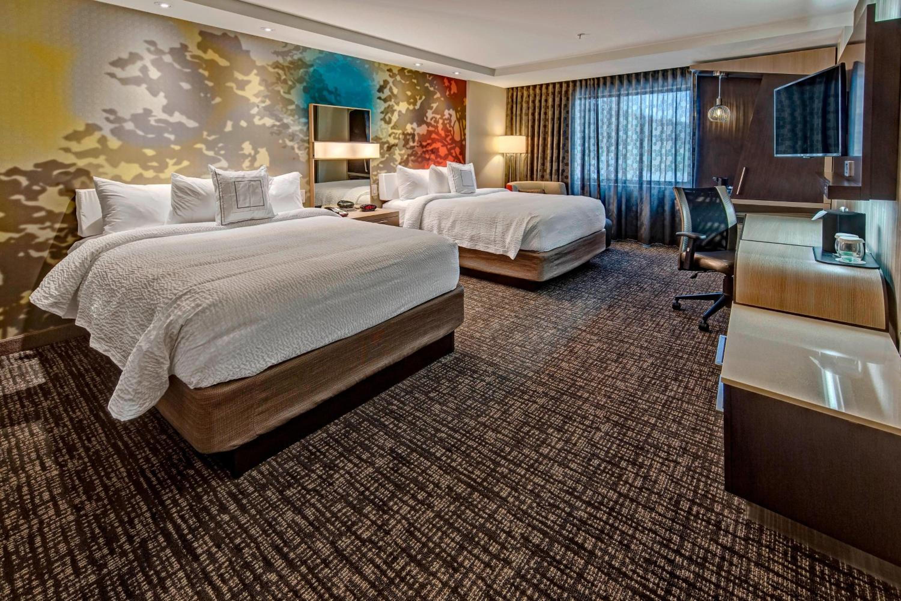 Queen Room with Two Queen Beds - Hearing Accessible photo 1