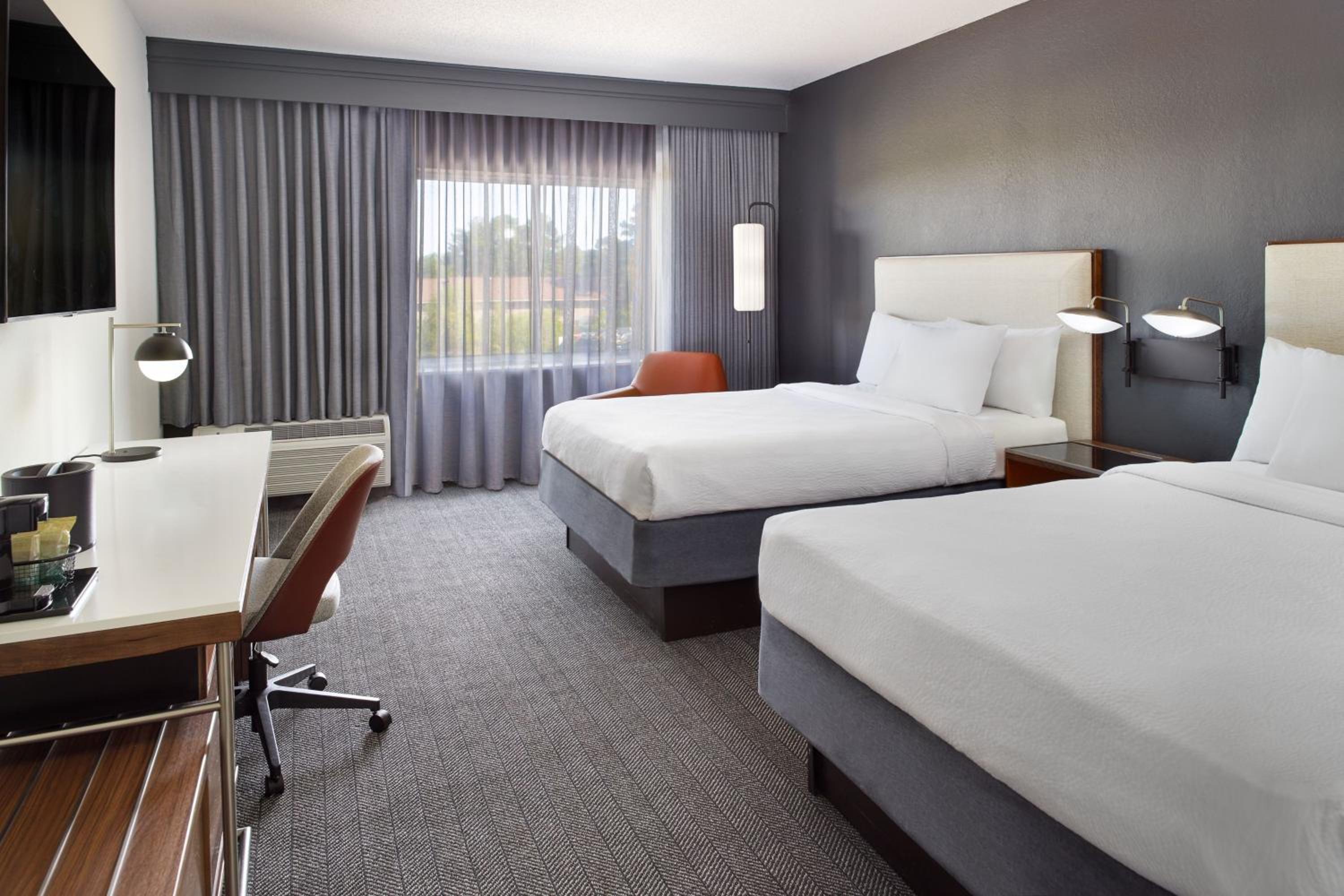 Queen Room with Two Queen Beds - Photo 1