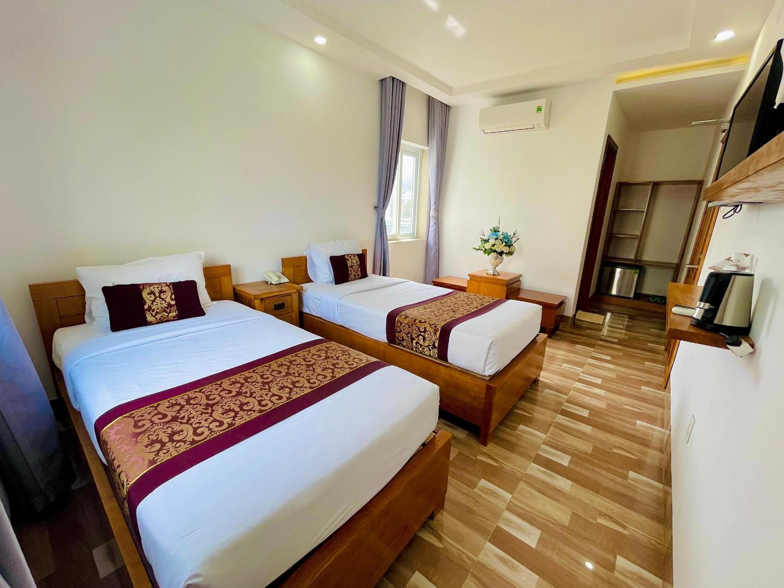 Twin Room - Photo 1