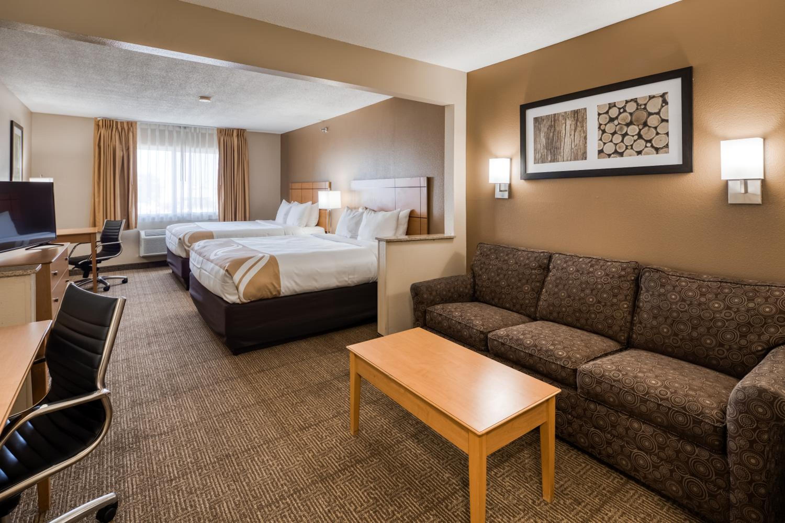 Queen Suite with Two Queen Beds and Living Room - Non Smoking - Photo 1