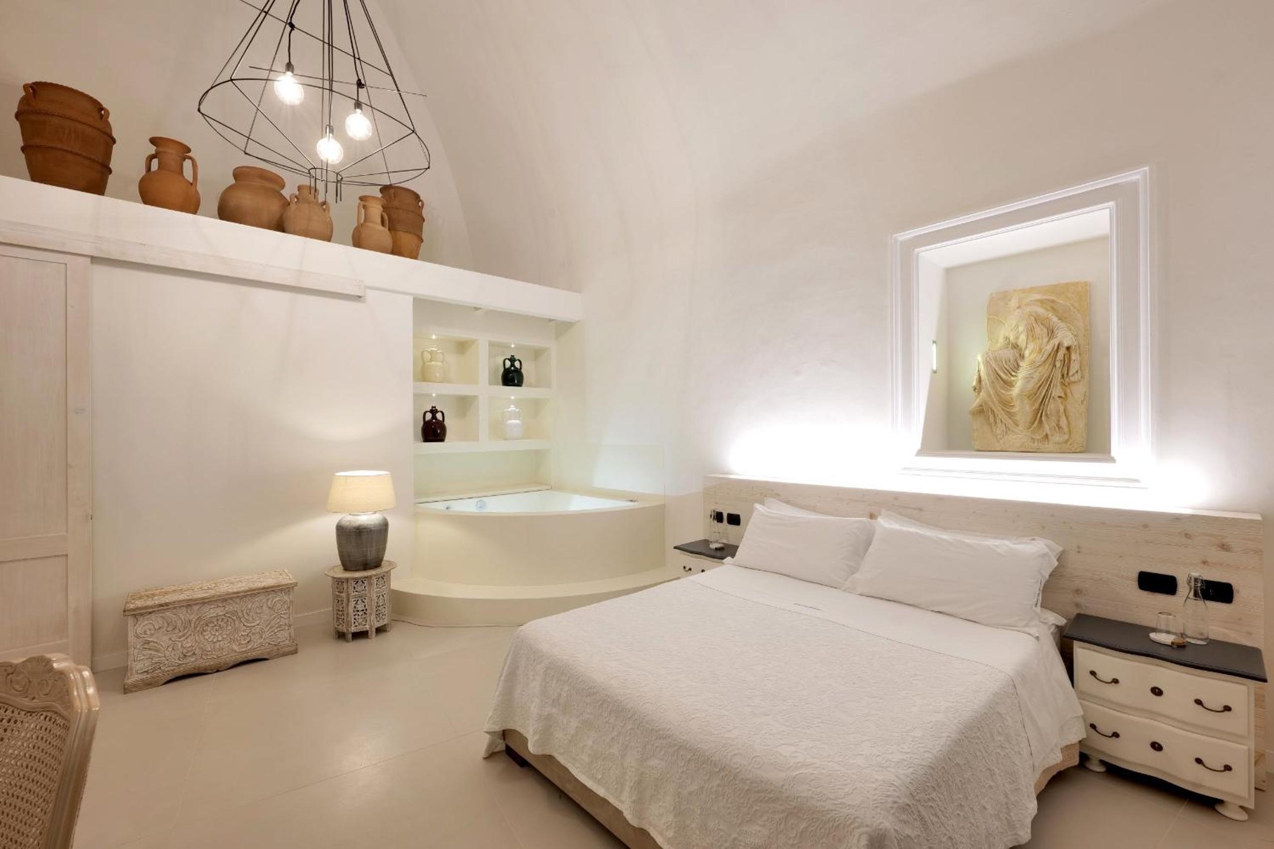 Suite mit Balkon und Whirlpool-Bad