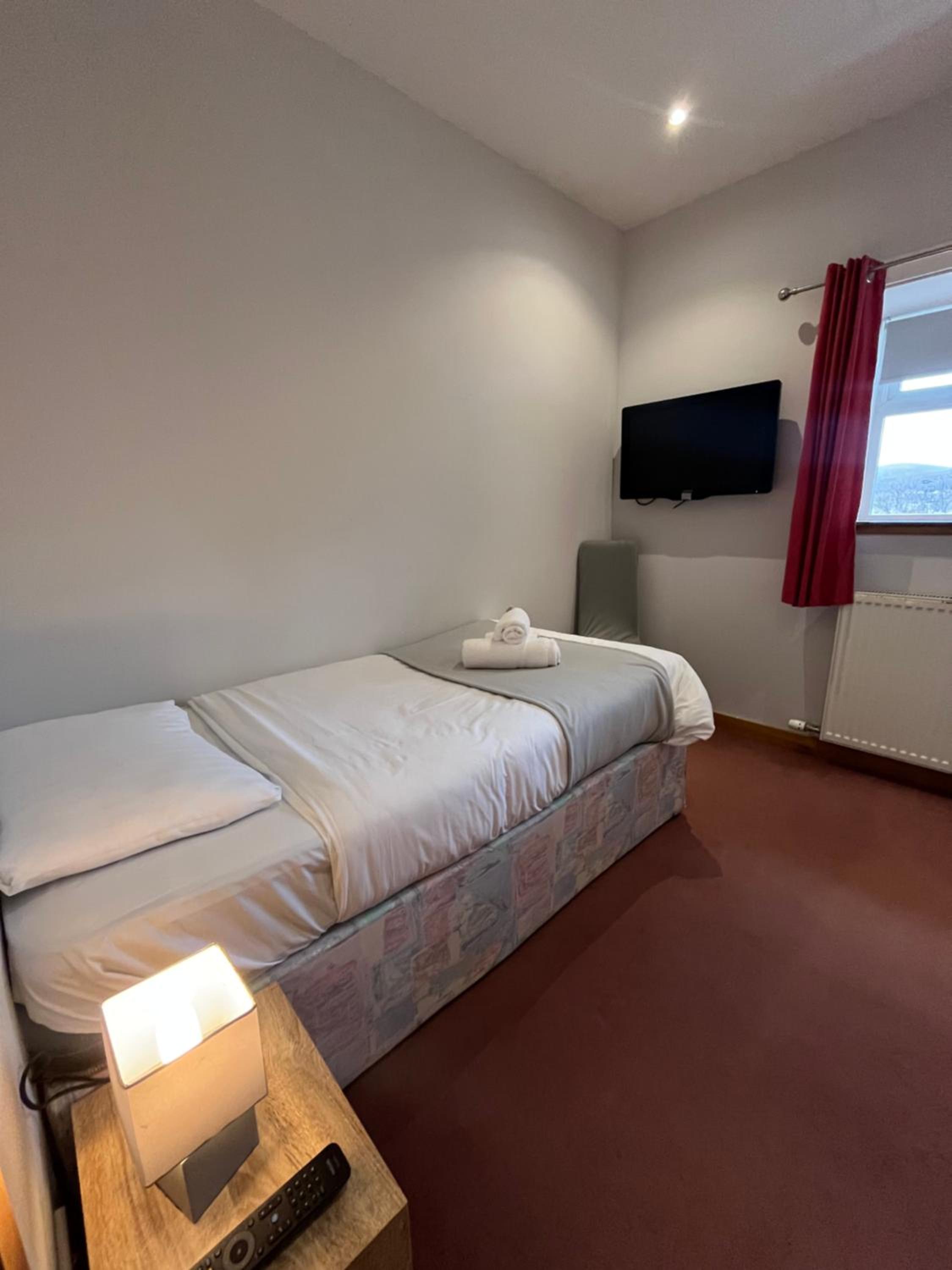 Single Room with Shared Shower and Toilet