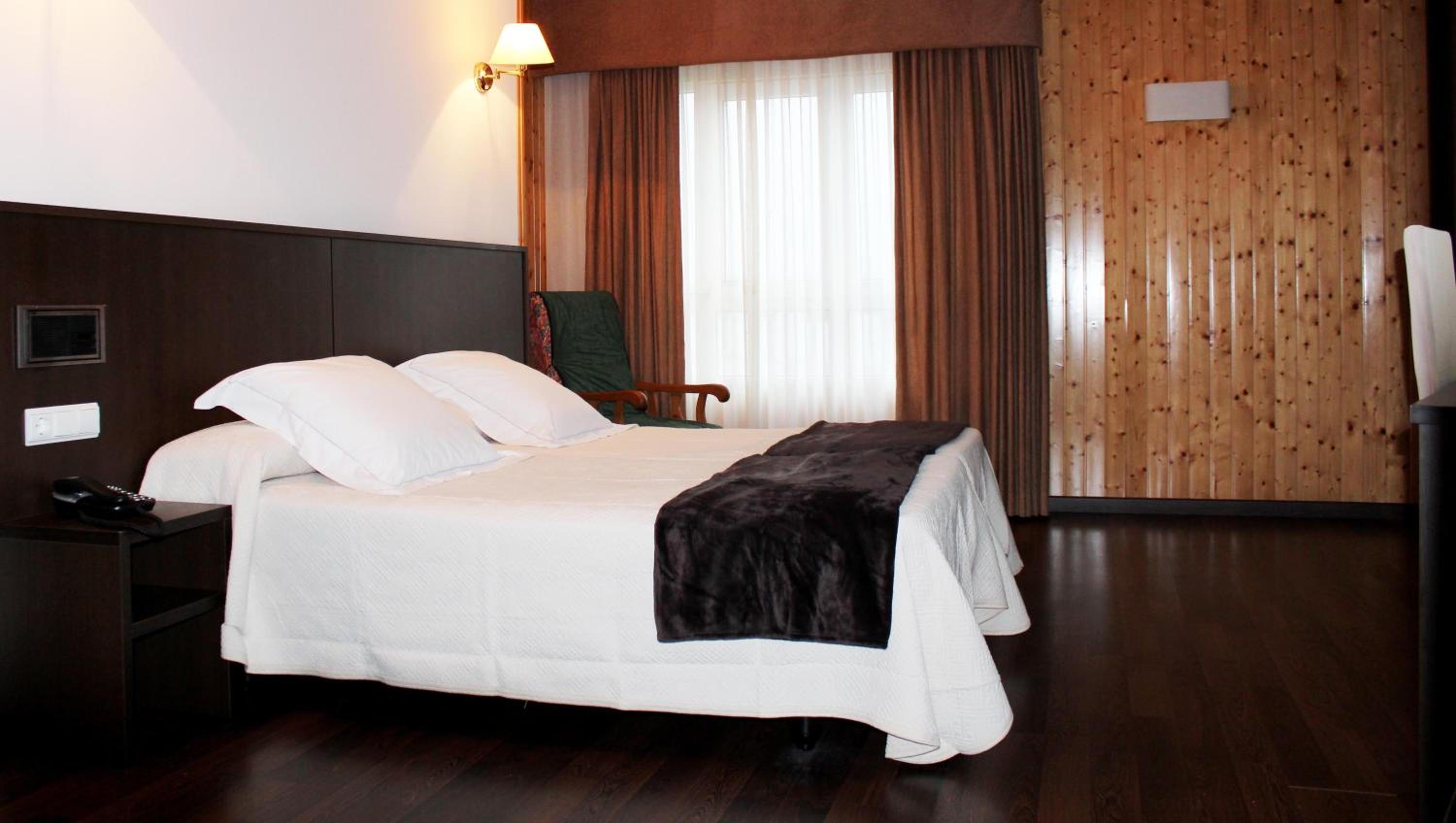 Habitación Doble o con Dos Camas (1-2 Adultos)