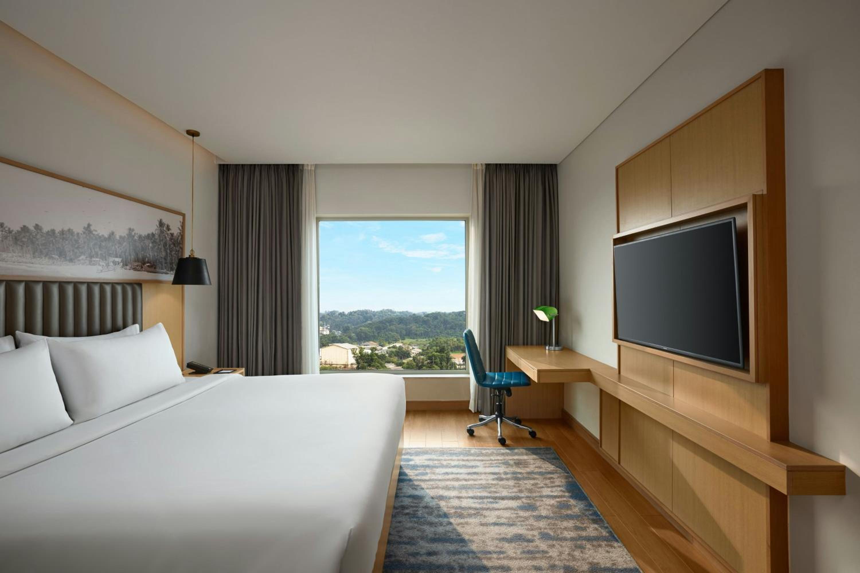 One-Bedroom Apartment with One King Bed and Concierge Lounge Access Includes 500 INR property credit and Cocktail hours from 6:00 PM – 8:00 PM