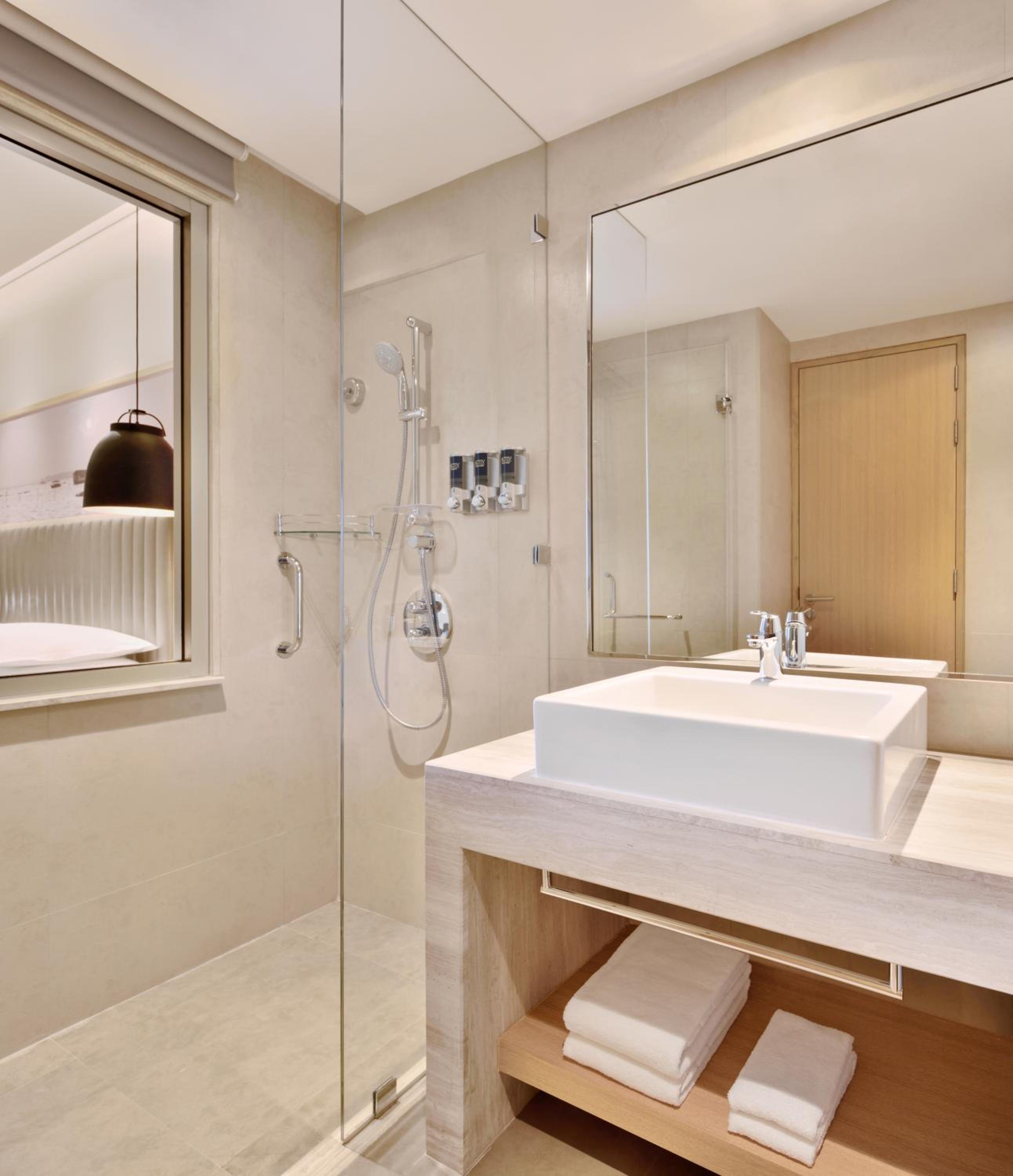 Deluxe King Room with City View Includes 500 INR property credit Deluxe King Room with City View Includes 500 INR property credit