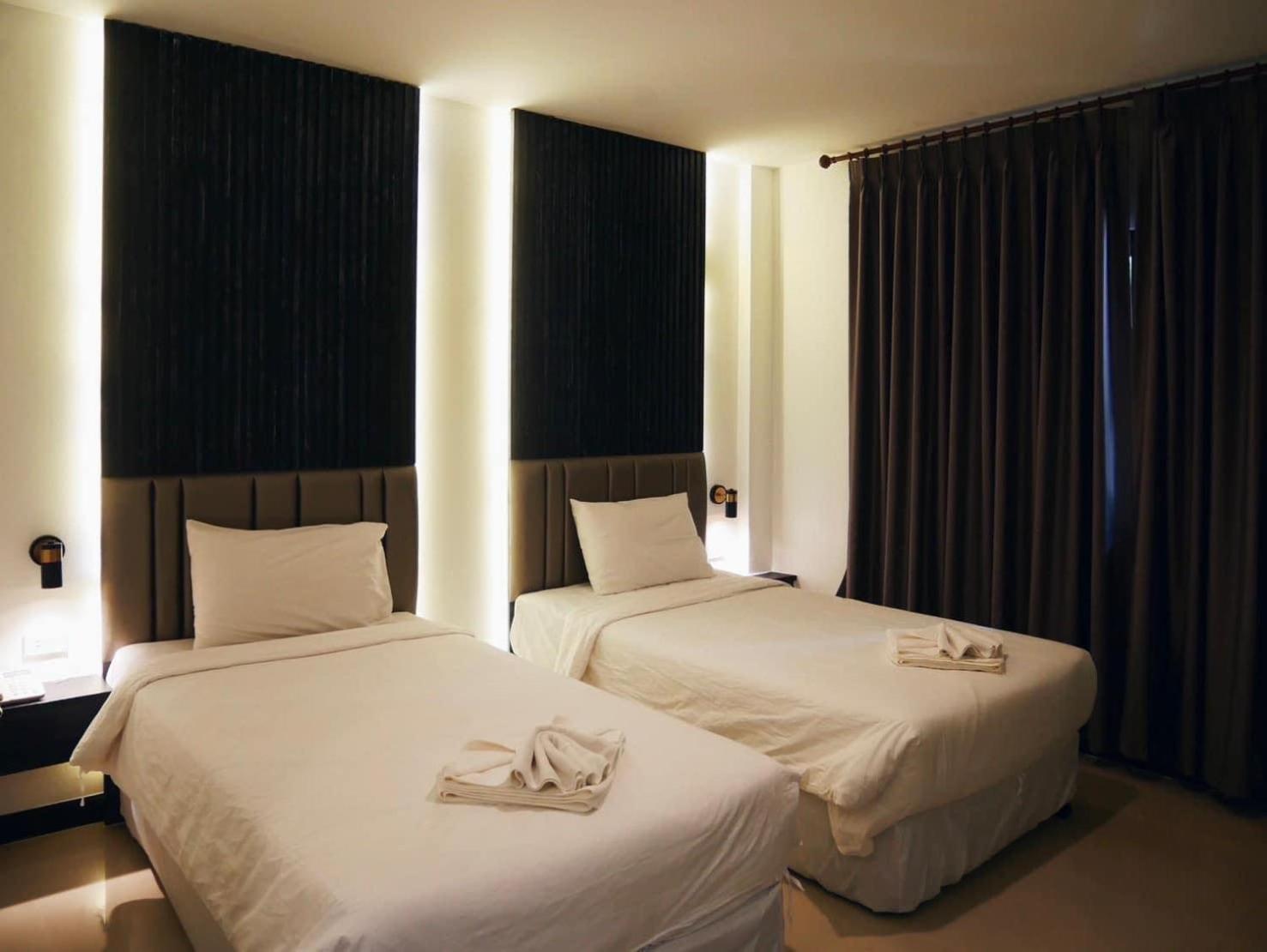 Deluxe Twin Room - Photo 9