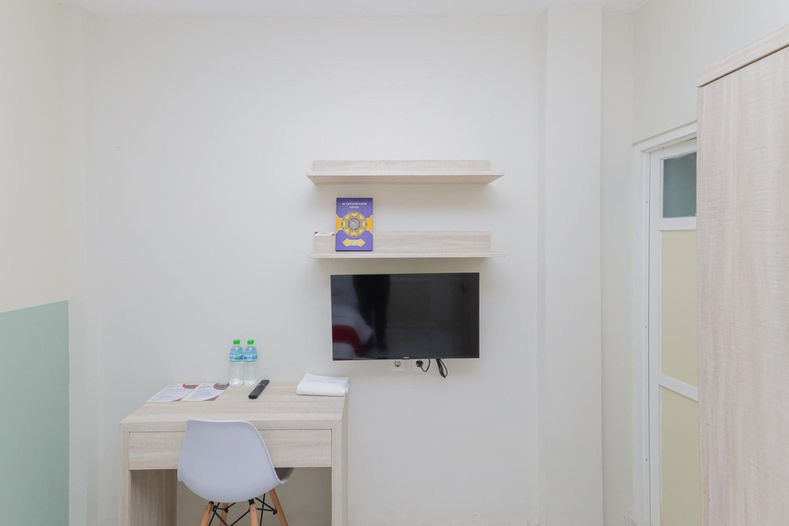 Deluxe Room - Photo 5