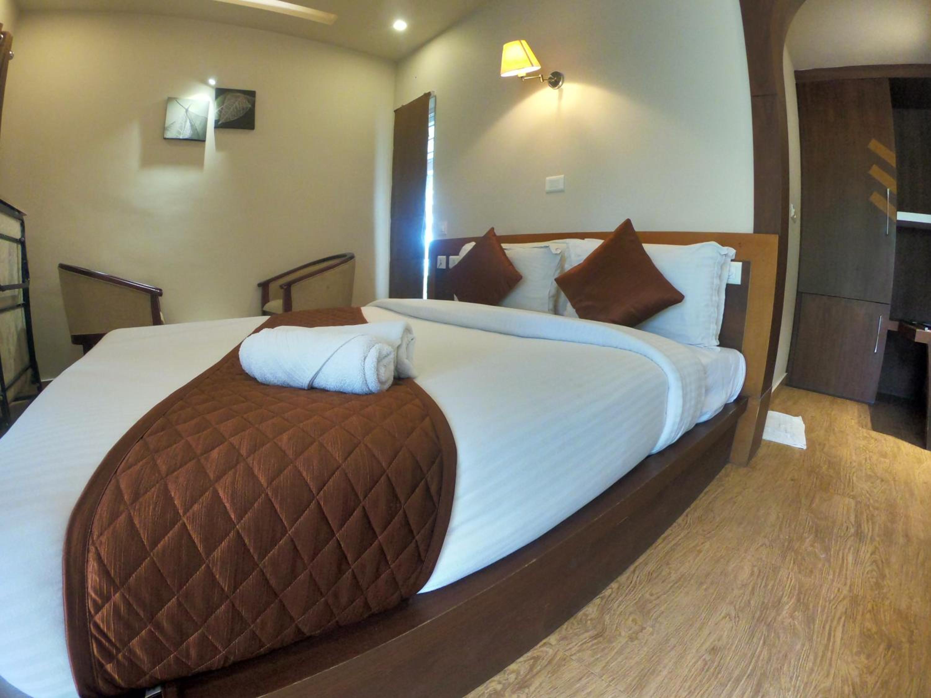 Deluxe Room - Photo 1