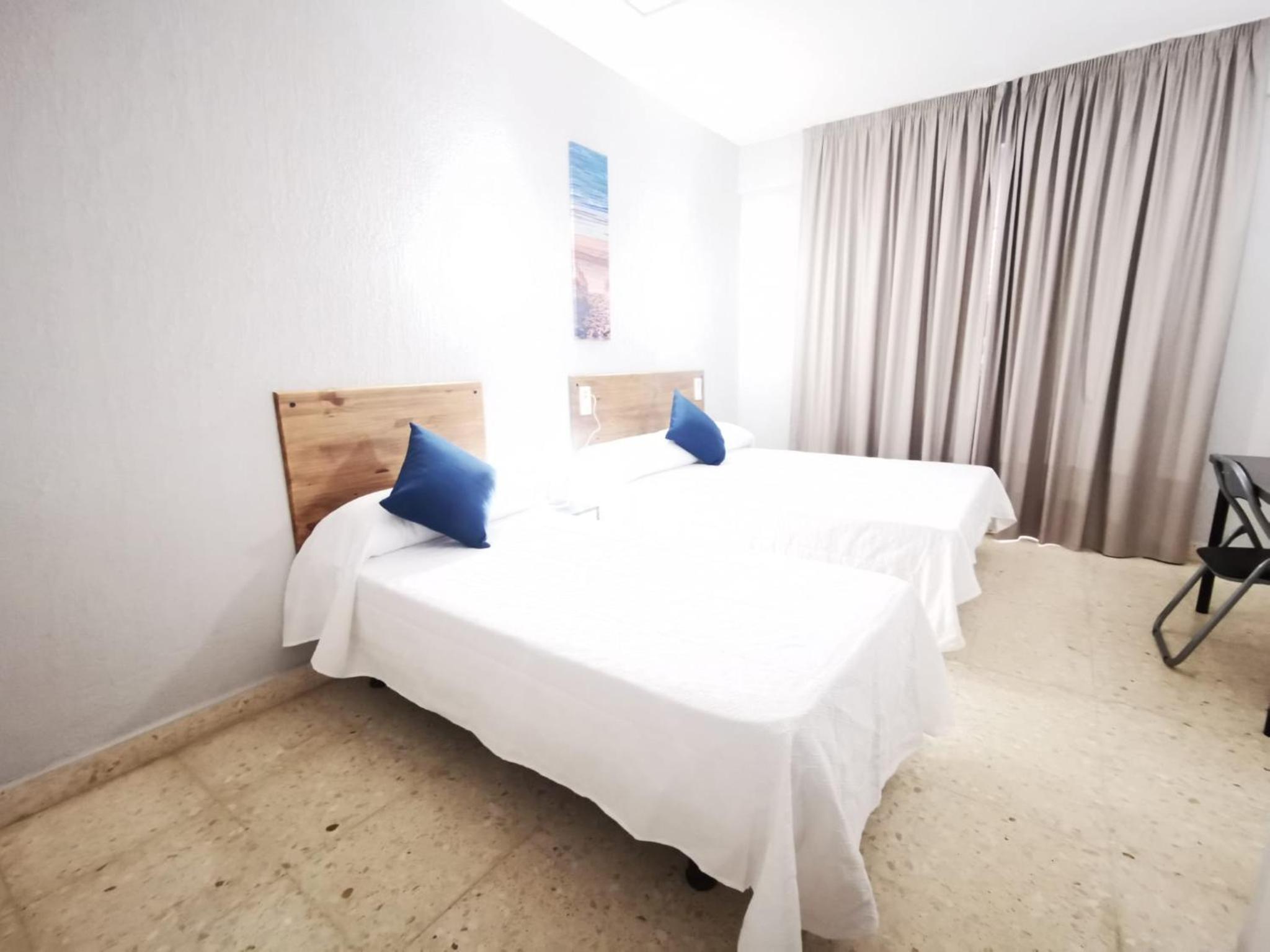 Habitación Triple con Balcón