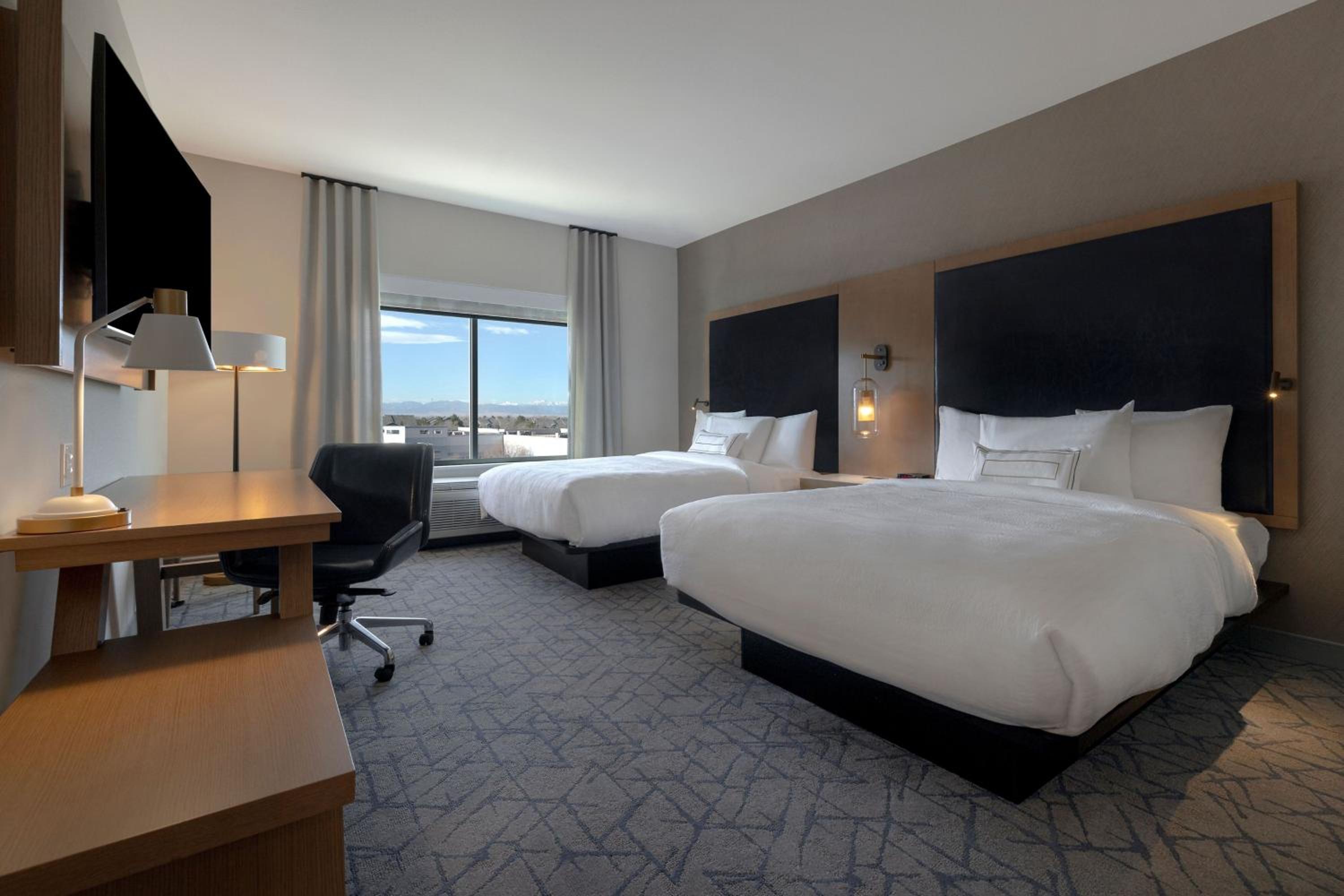 Queen Room with Two Queen Beds - City View - Photo 1
