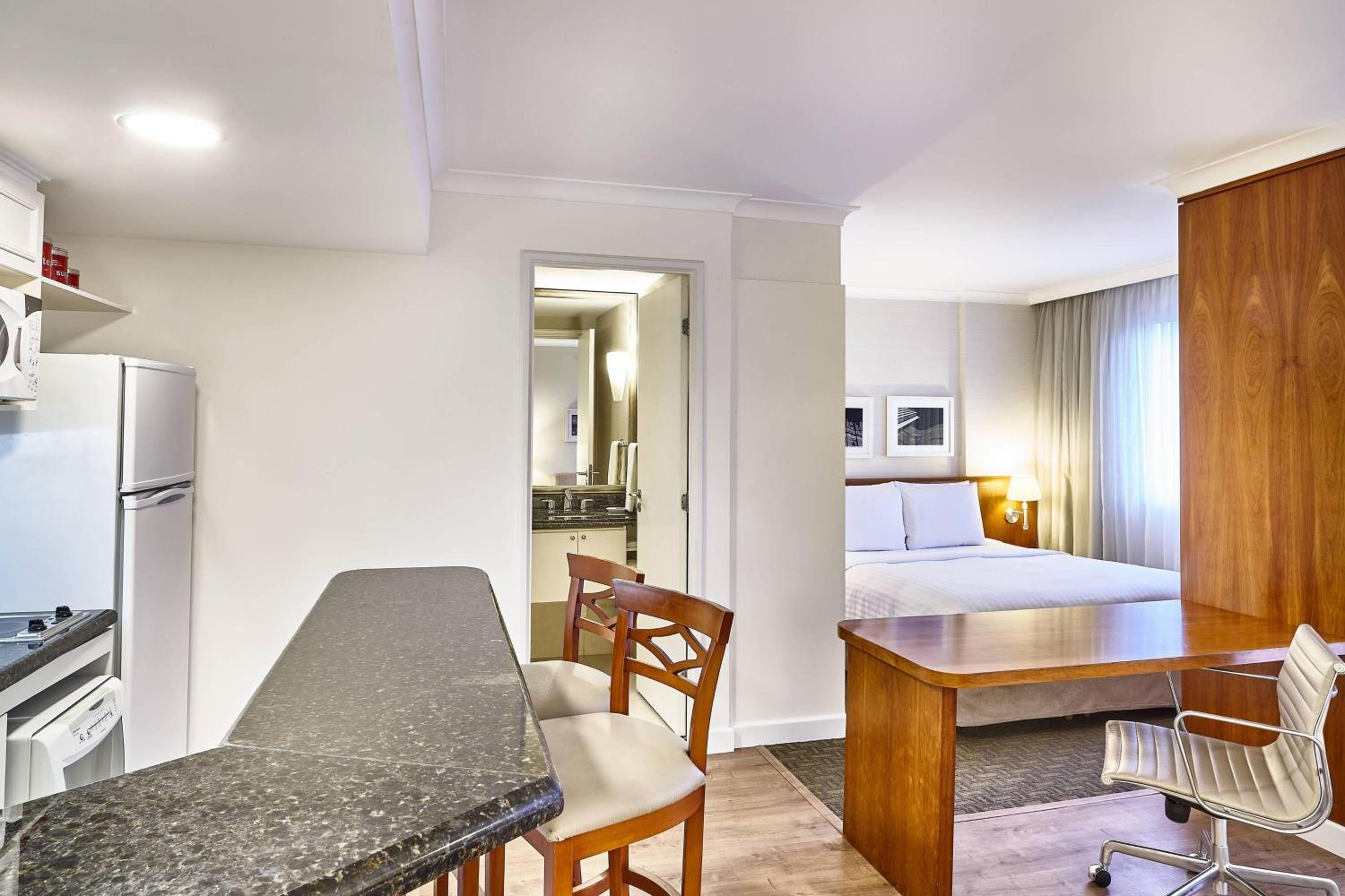 One-Bedroom Apartment with Balcony and City View