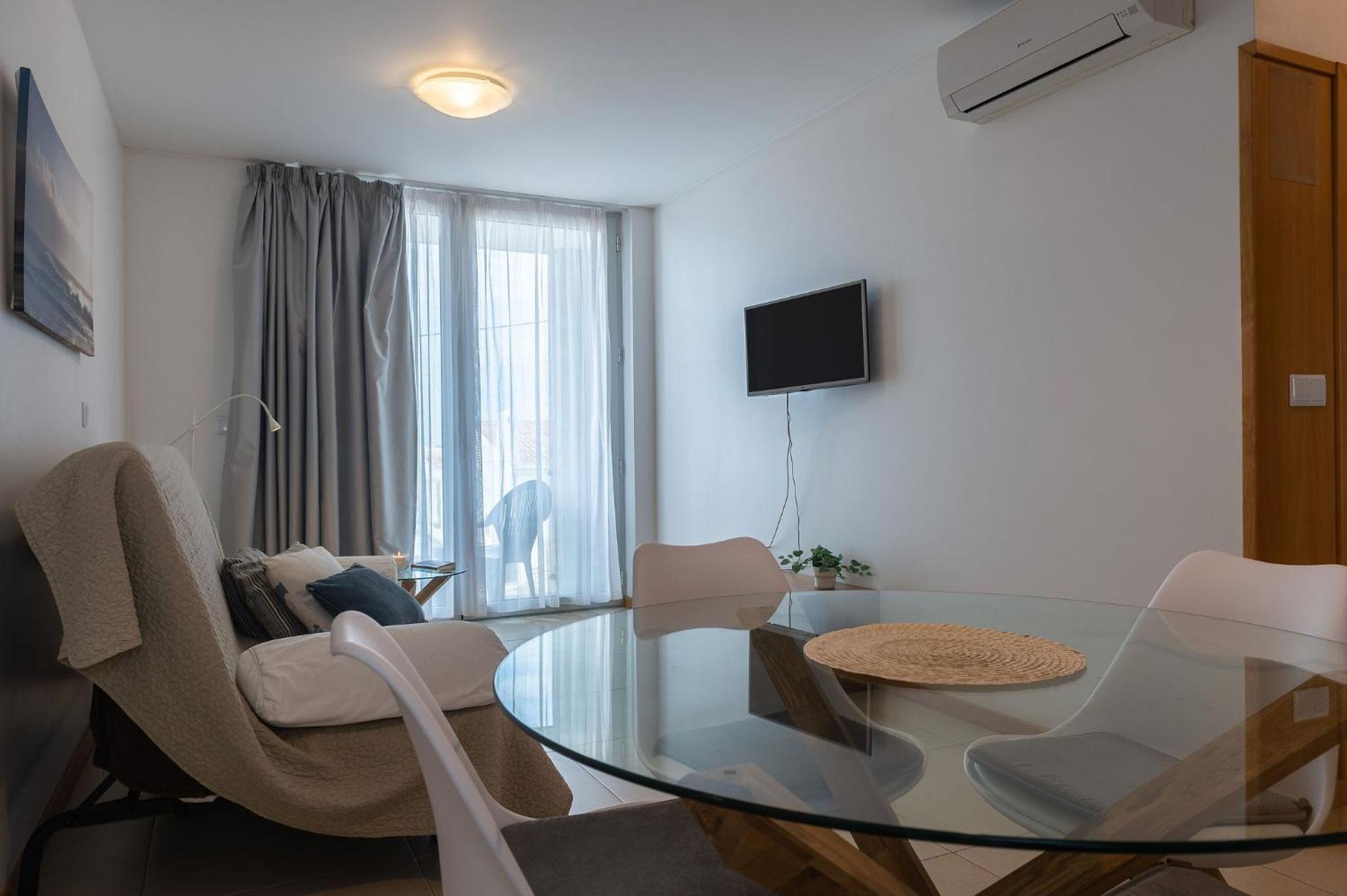  Comfort One-Bedroom Apartment with Balcony and Partial Sea VIew - 1st Floor photo 1