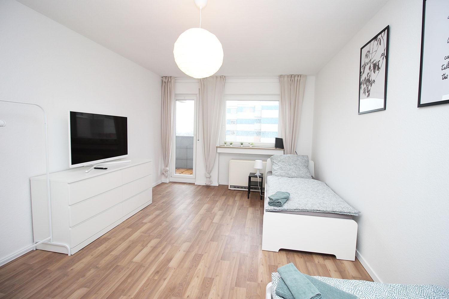 Three-Bedroom Apartment photo 1