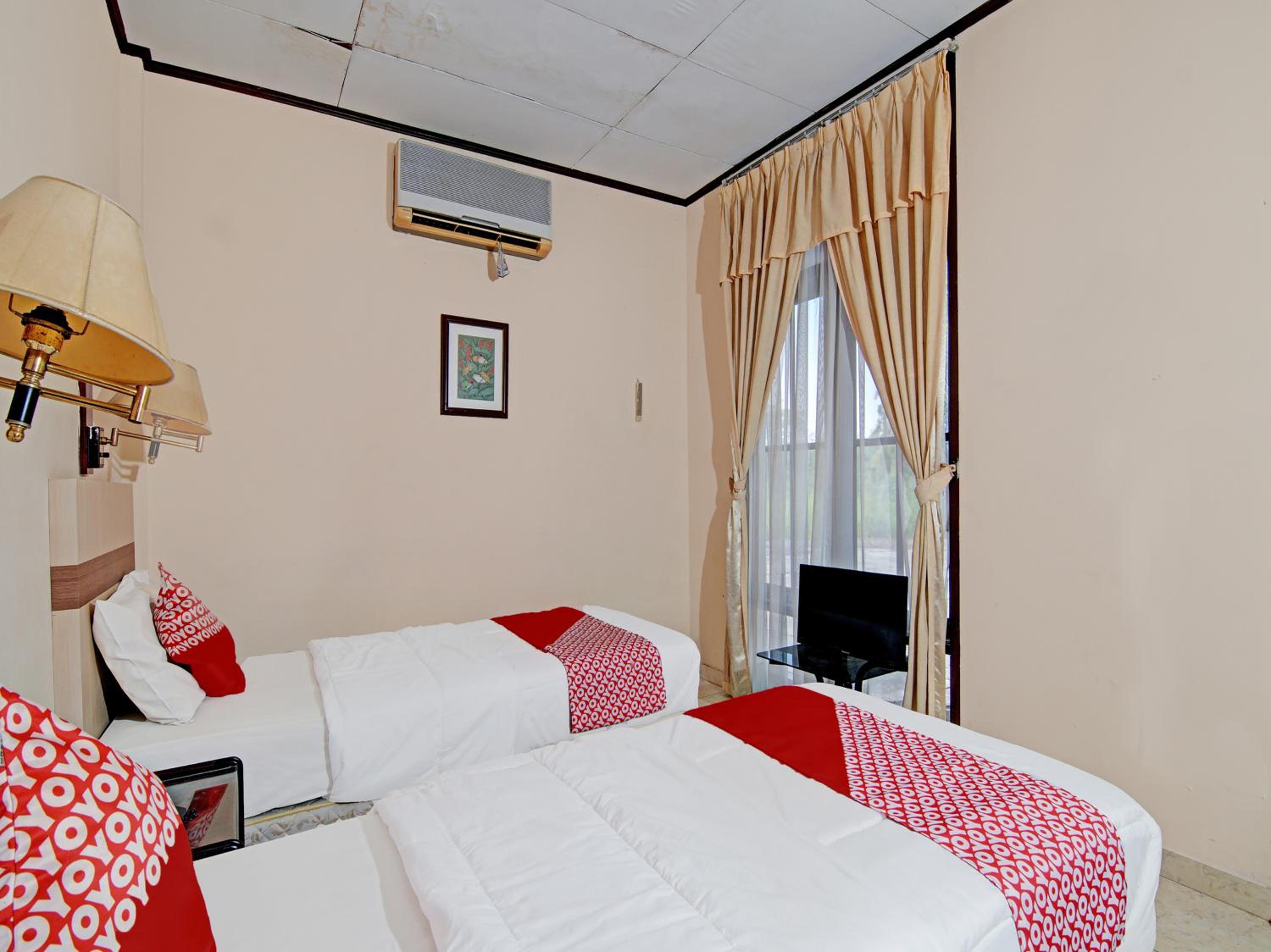 Delxue Twin Room - Photo 5