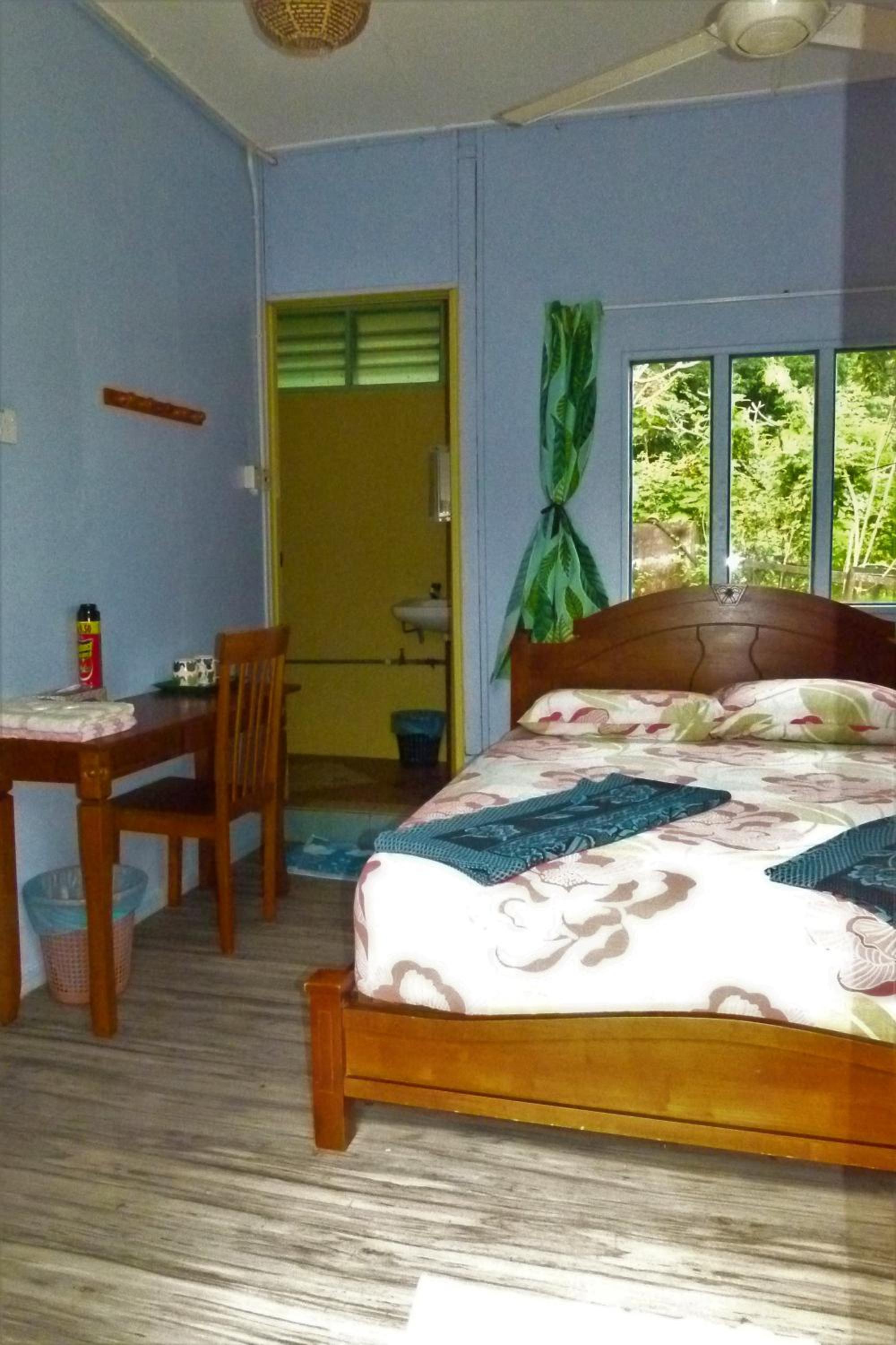 Fan Queen Bed Room with Private Shower Room photo 2