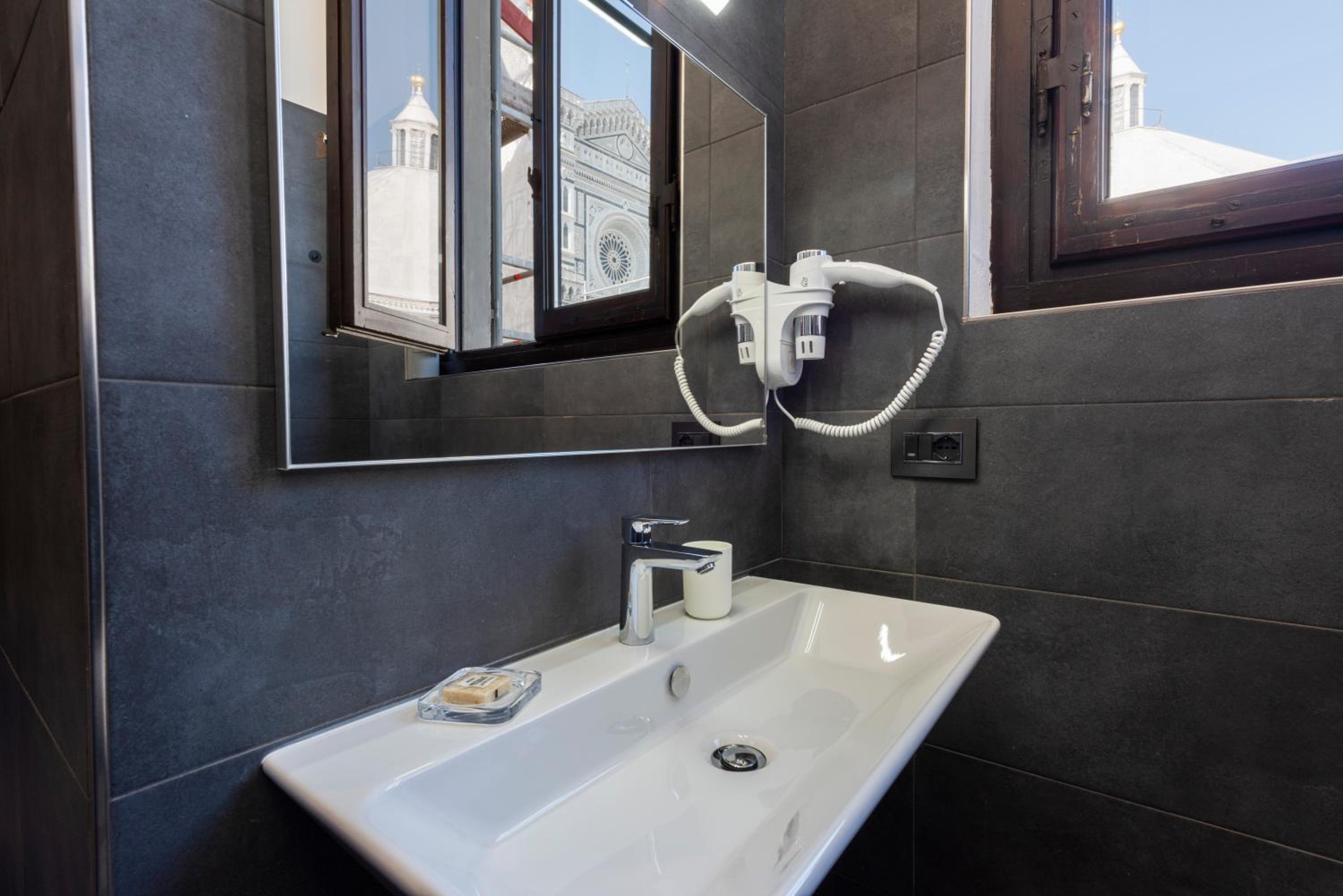 Double or Twin Room with Duomo view thumbnail 5