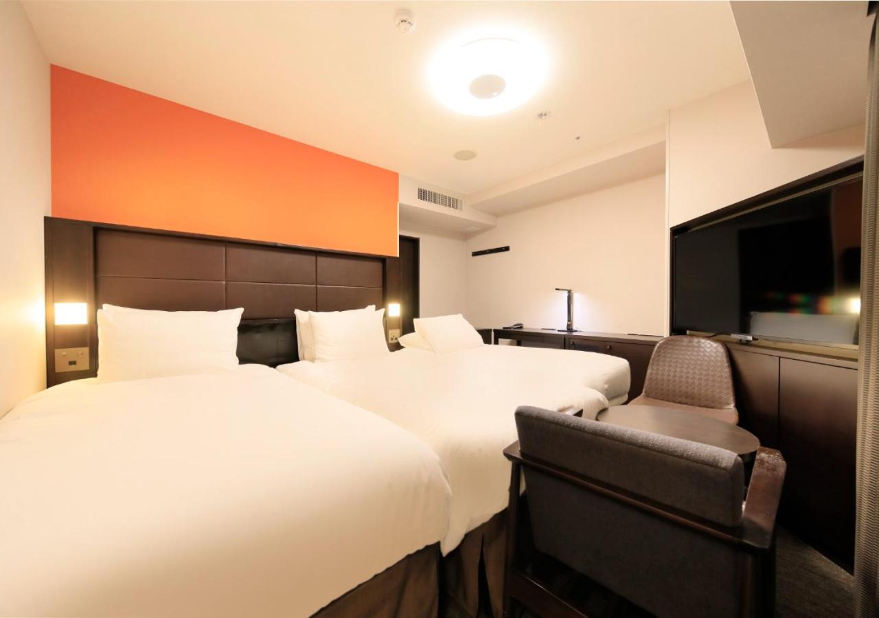 Superior Twin Room with Extra Bed - Smoking photo 1
