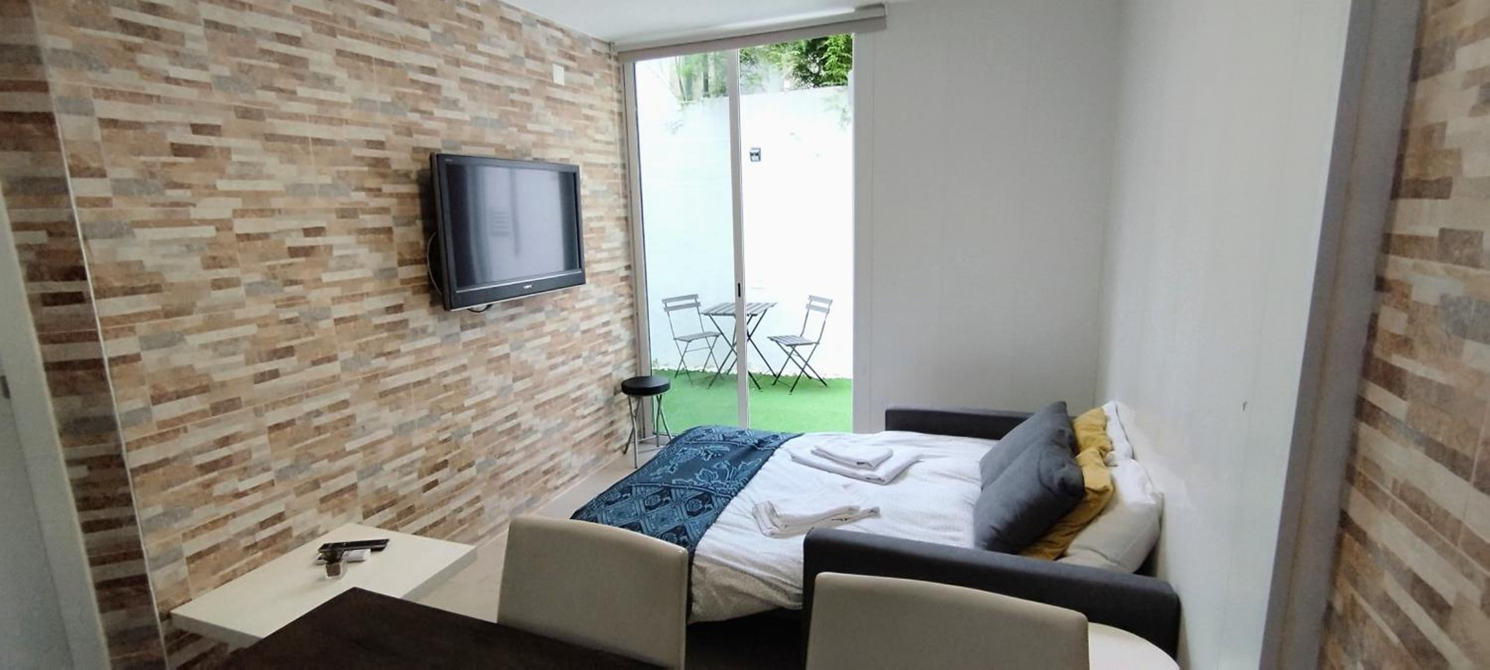 Three-Bedroom Apartment - Photo 1