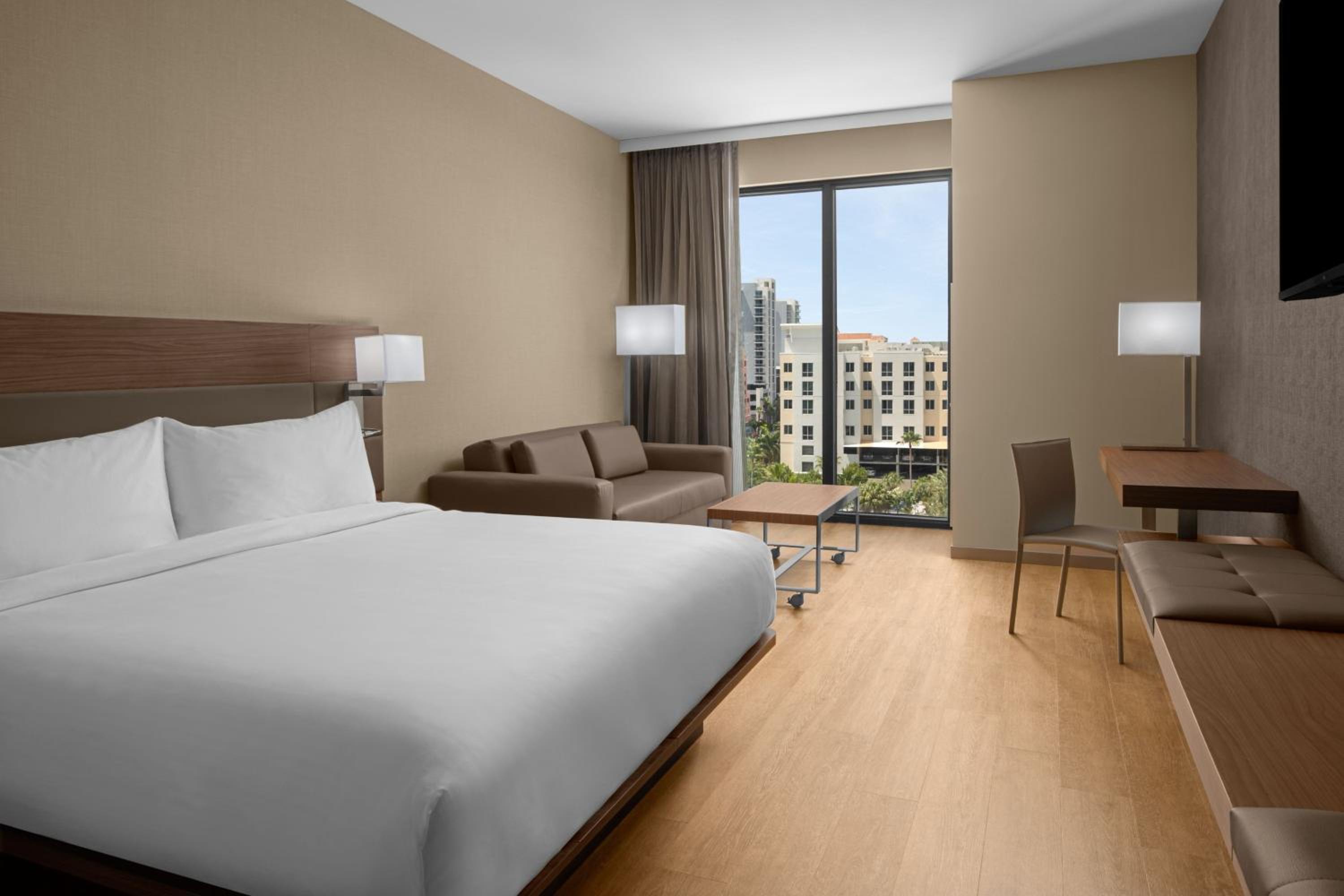 King Room with Sofa Bed and Partial Water View