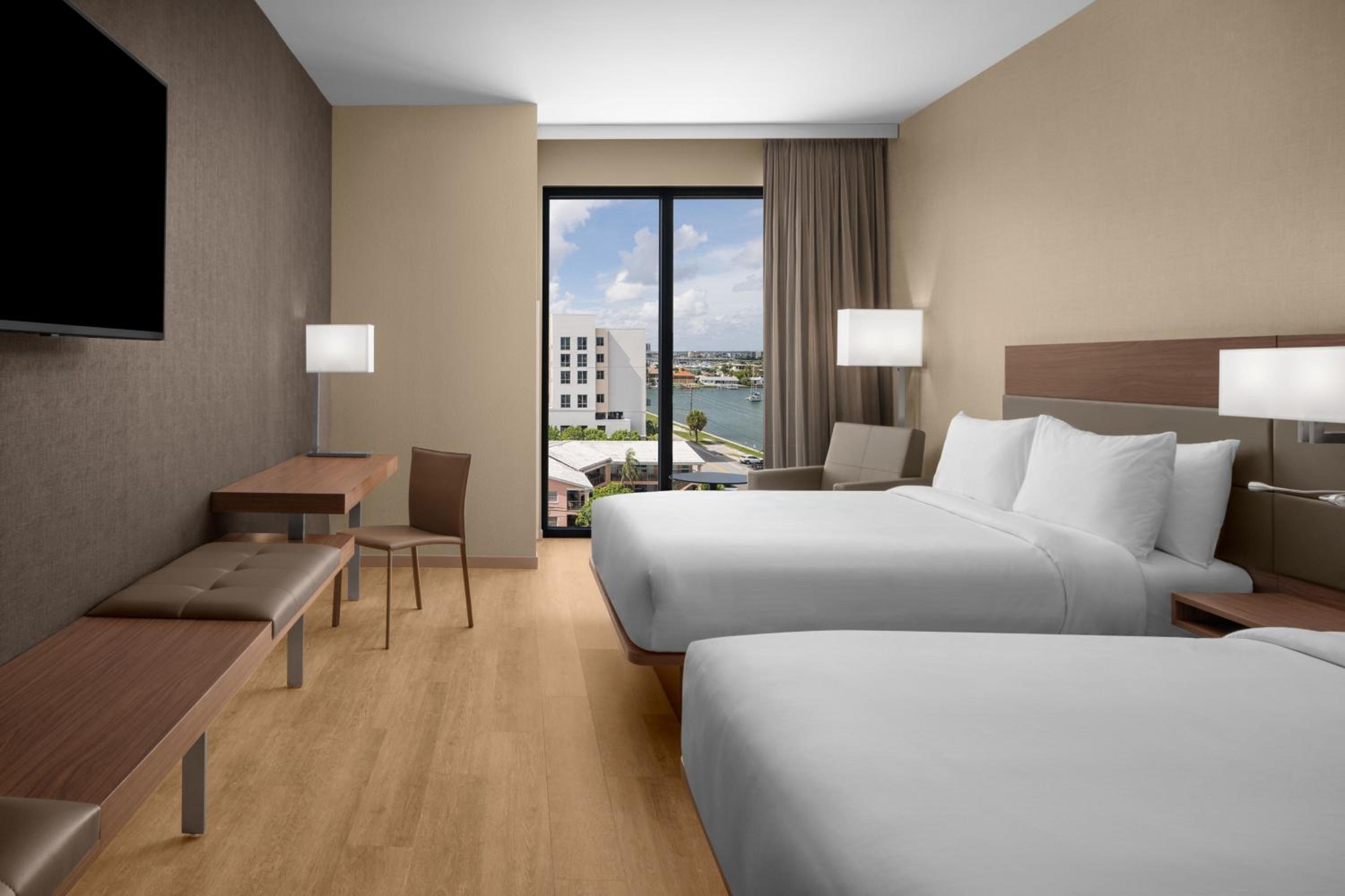 Queen Room with Two Queen Beds and Partial Water View