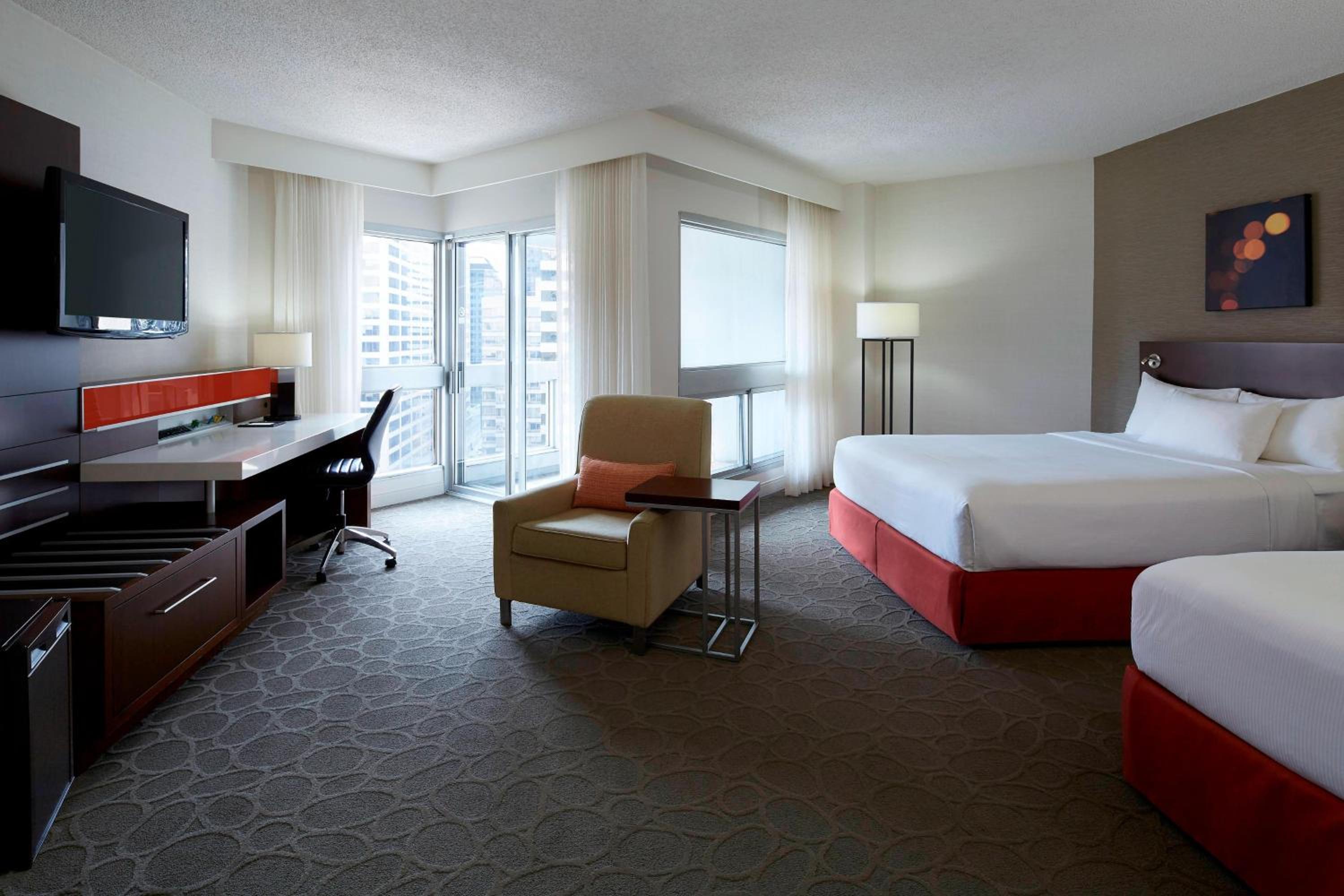 Deluxe Queen Room with Two Queen Beds - Photo 1