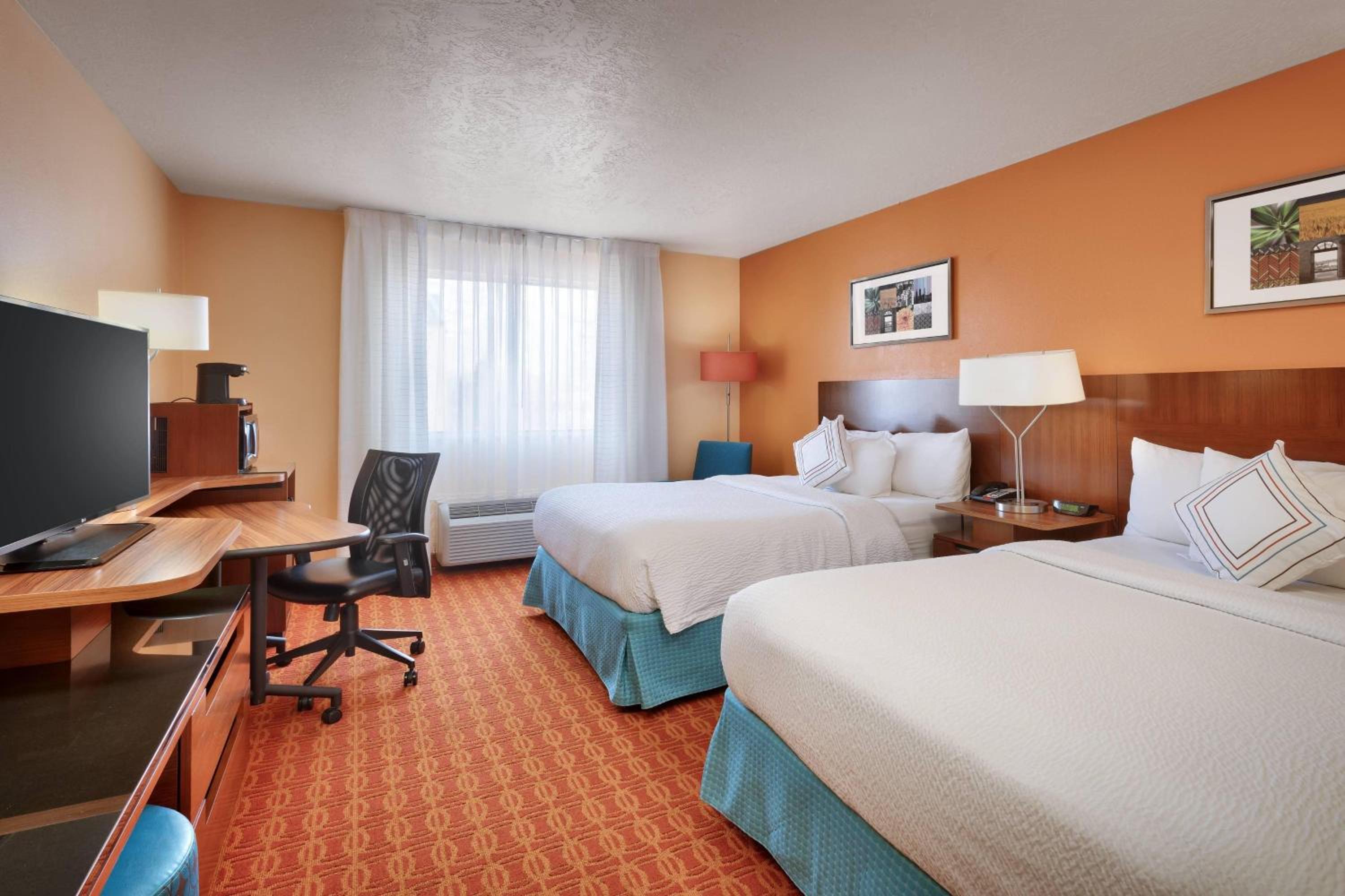 Queen Room with Two Queen Beds - Photo 1