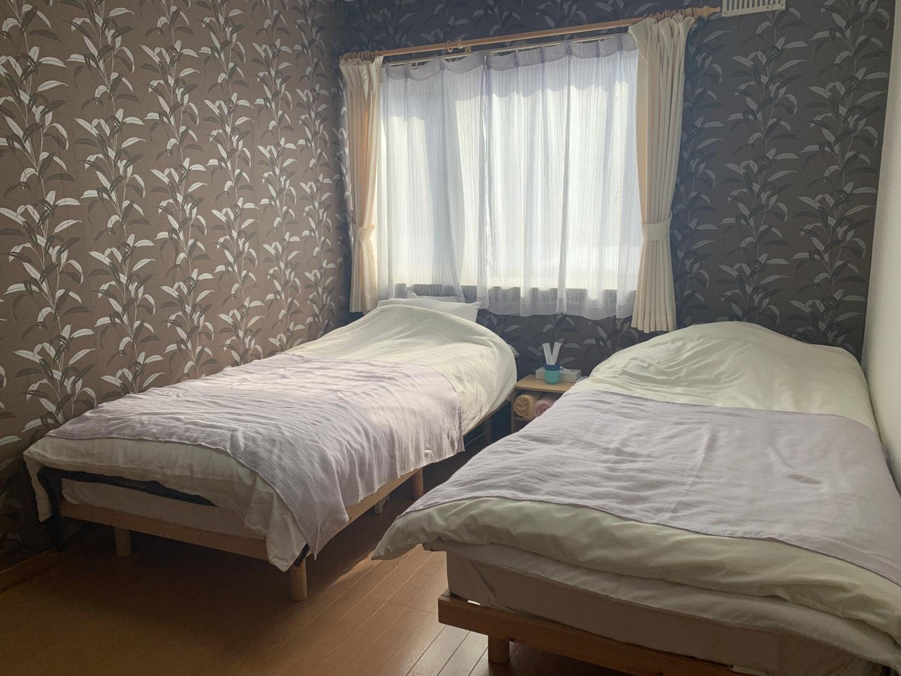 Twin Room with Shared Bathroom photo 1