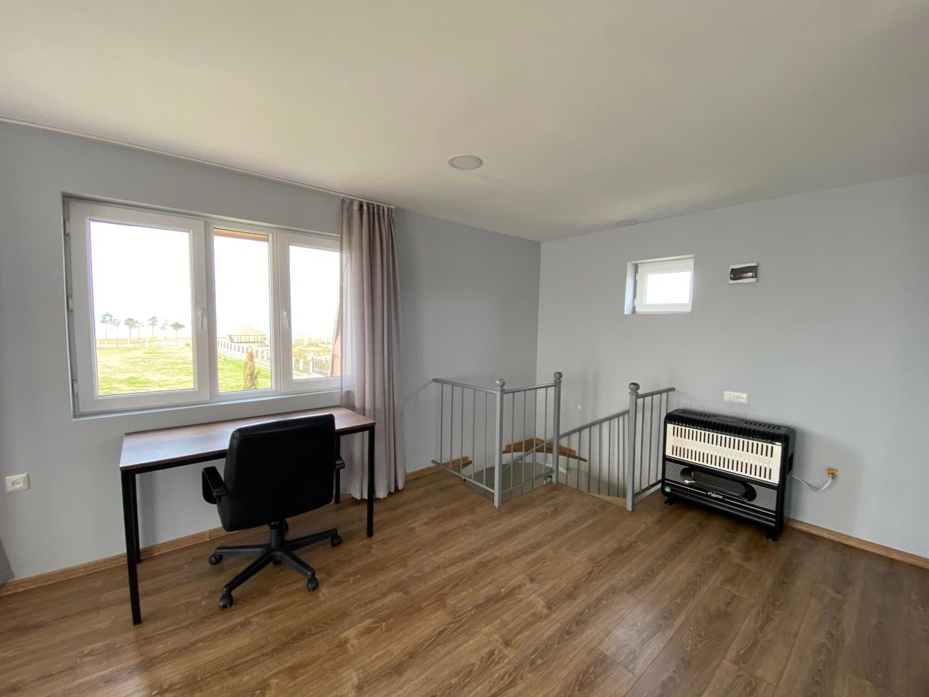 Three-Bedroom House photo 1